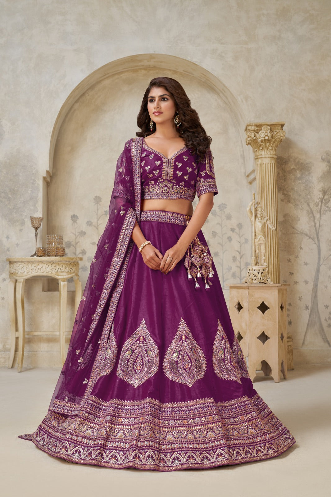 Purple Silk Embroidered Bridal Lehenga with Designer Net Dupatta Silk lehenga Anant Tex Exports Pvt.Ltd..