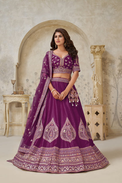 Purple Silk Embroidered Bridal Lehenga with Designer Net Dupatta Silk lehenga Anant Tex Exports Pvt.Ltd..