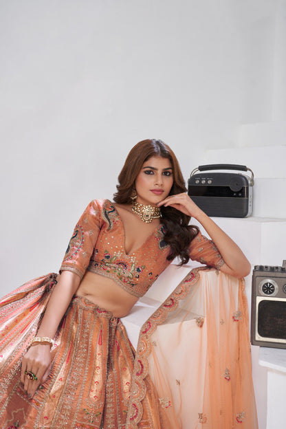 Orange Banarasi Silk Bridal Lehenga with Embroidered Mughal Motifs Banarasi Silk Lehenga Anant Tex Exports Pvt.Ltd..