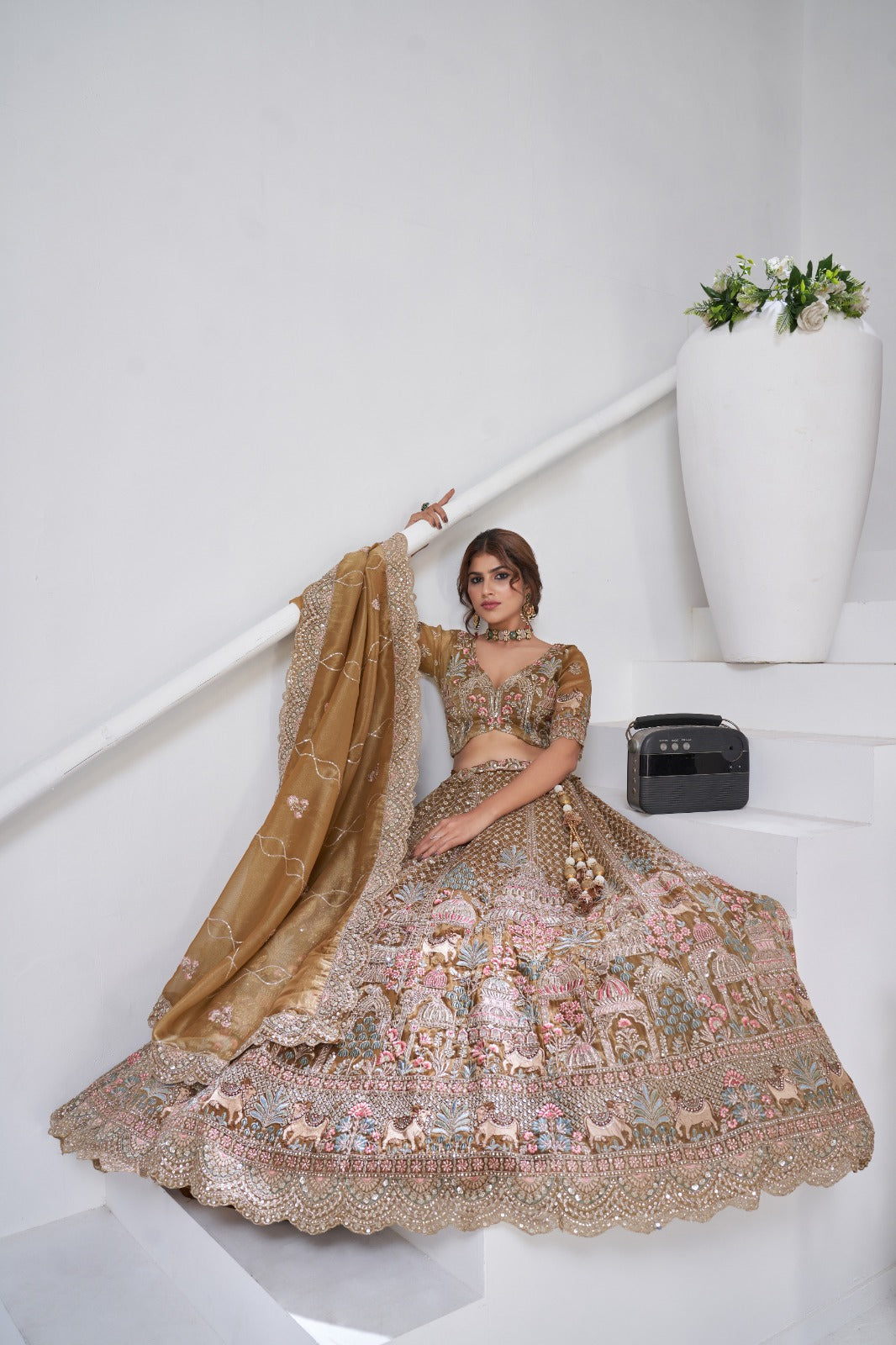 Gold Organza Tissue Bridal Lehenga with Embroidery &amp; Temple Motifs Organza Lehenga Anant Tex Exports Pvt.Ltd..