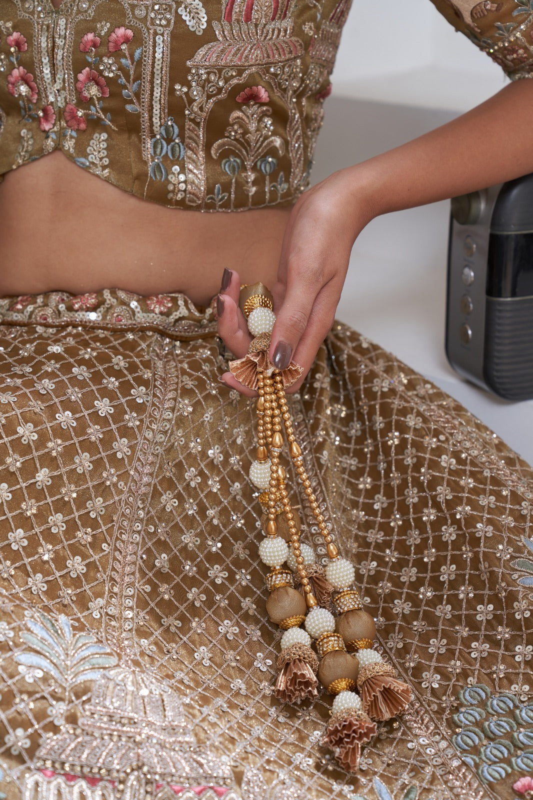 Gold Organza Tissue Bridal Lehenga with Embroidery & Temple Motifs