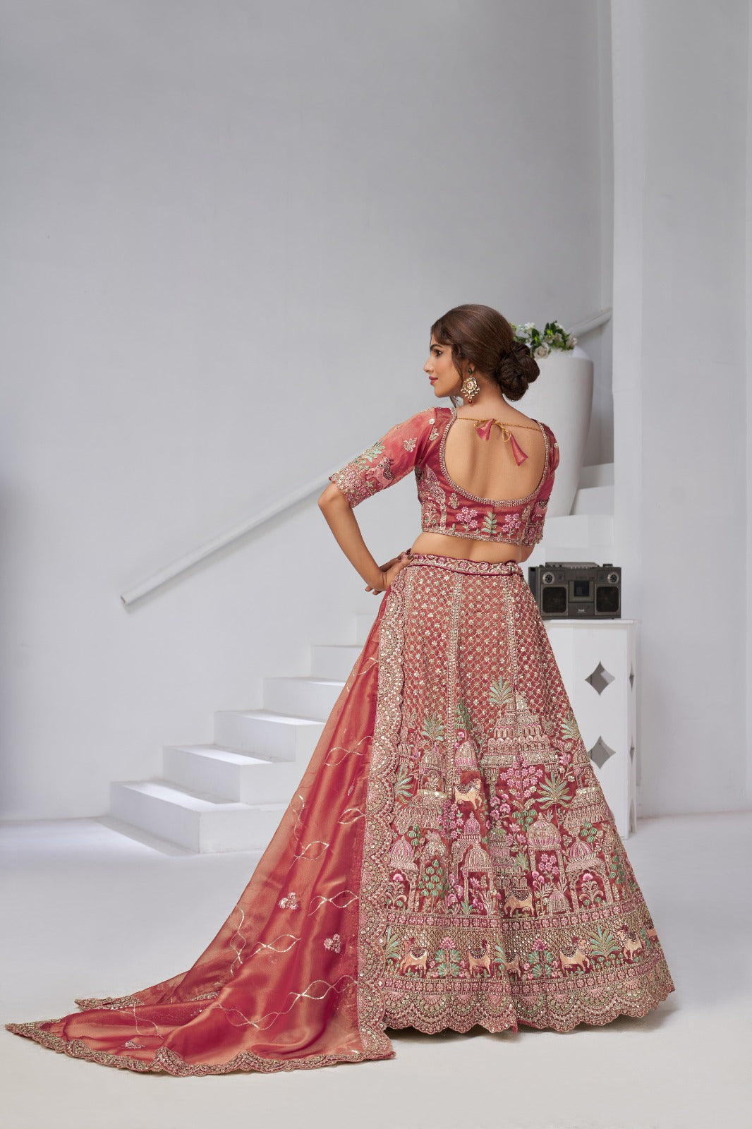 Pastel Pink Organza Tissue Bridal Lehenga with Auspicious Cow