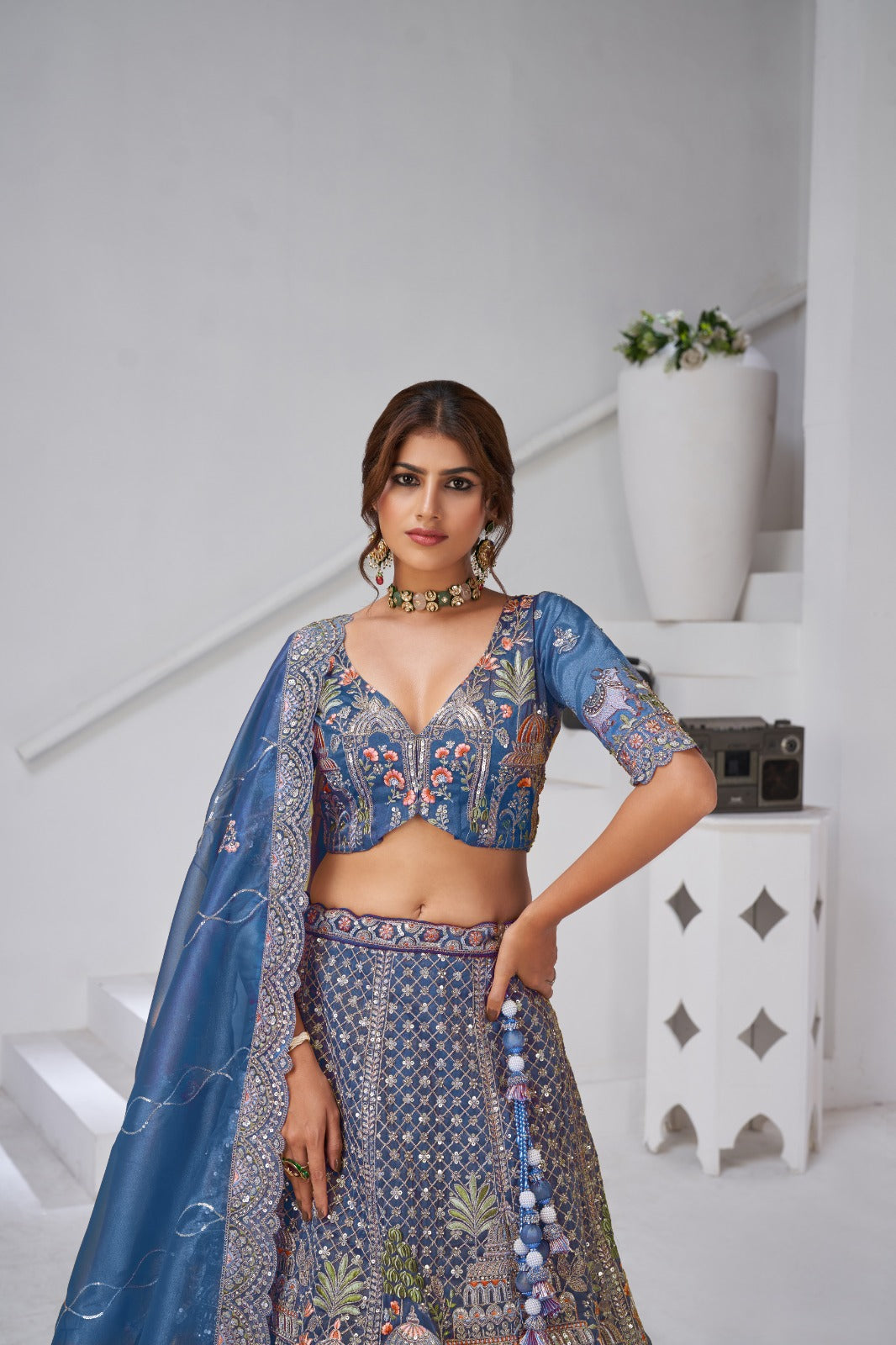 Blue Organza Tissue Bridal Lehenga with Temple &amp; Kamdhenu Cow Motifs Organza Lehenga Anant Tex Exports Pvt.Ltd..