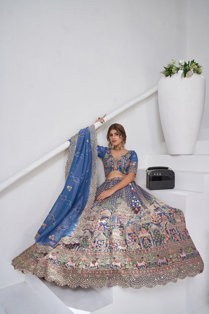 Blue Organza Tissue Bridal Lehenga with Temple &amp; Kamdhenu Cow Motifs Organza Lehenga Anant Tex Exports Pvt.Ltd..