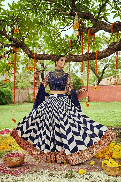 White & Navy Maslin Cotton Digital Printed With Thread Embroidered With All Over Mirror Work Lehenga.