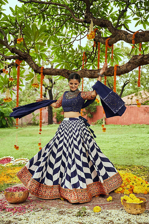 White & Navy Maslin Cotton Digital Printed With Thread Embroidered With All Over Mirror Work Lehenga.