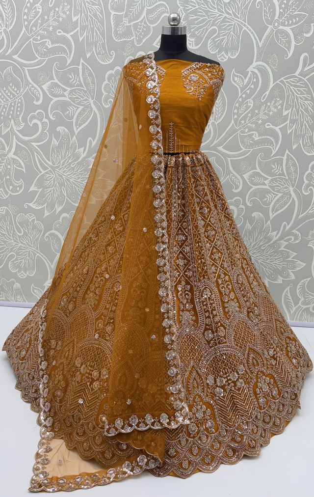 Rust Pure Heavy Net Motif Handwork Zari Sequins Work Bridal Lehenga Choli
