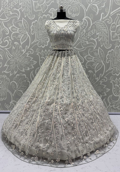 White Pure Soft Net Heavy Embroidery Work Bridal Lehenga Bridal Lehenga Anant Tex Exports Pvt.Ltd..