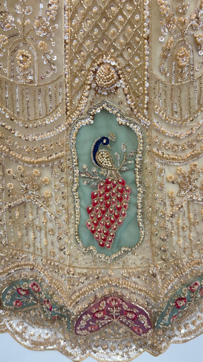 Beige Pure Heavy Net Motif Handwork Zari Sequins Work Bridal Lehenga Choli