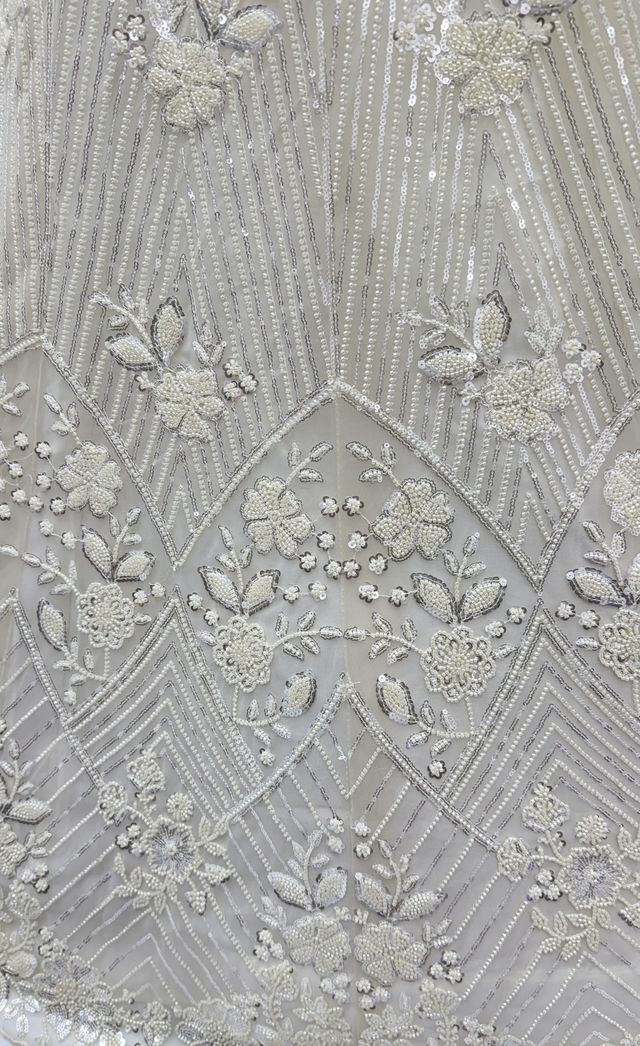 White Pure Heavy Net Motif Handwork Zari Sequins Work Bridal Lehenga Choli