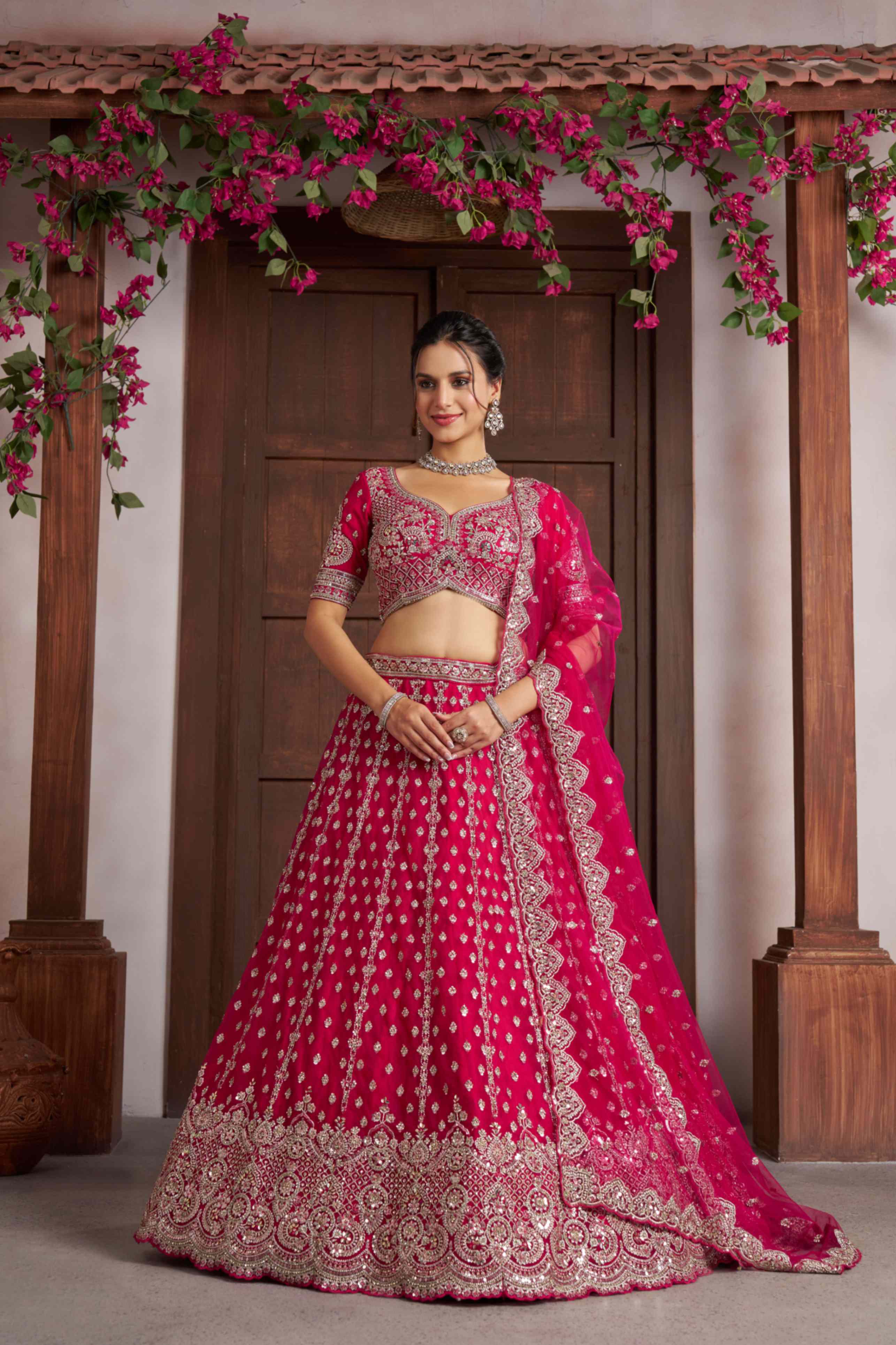 Rani Pink Net Lehenga Choli with Heavy Embroidery Work