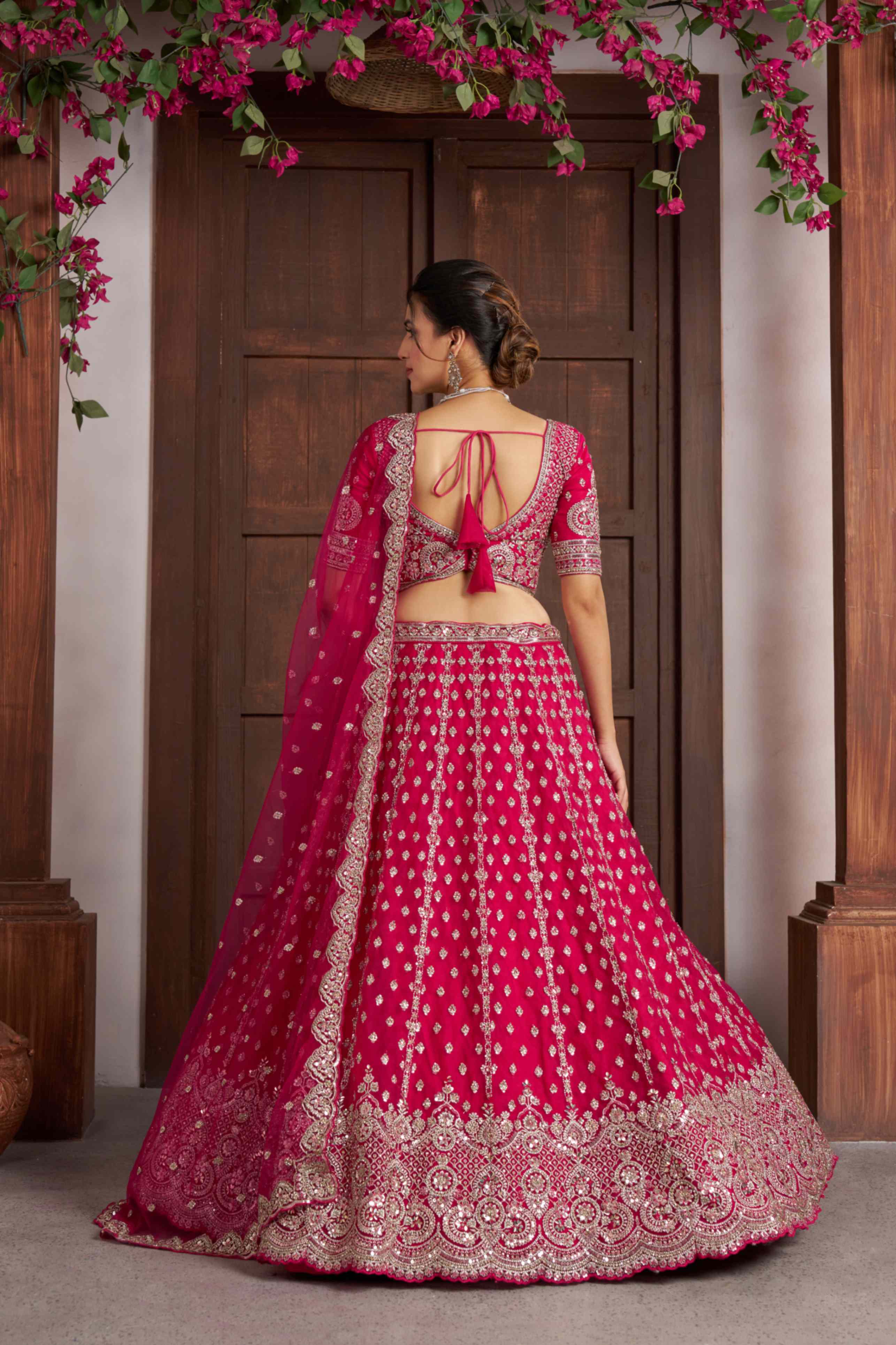 Rani Pink Net Lehenga Choli with Heavy Embroidery Work