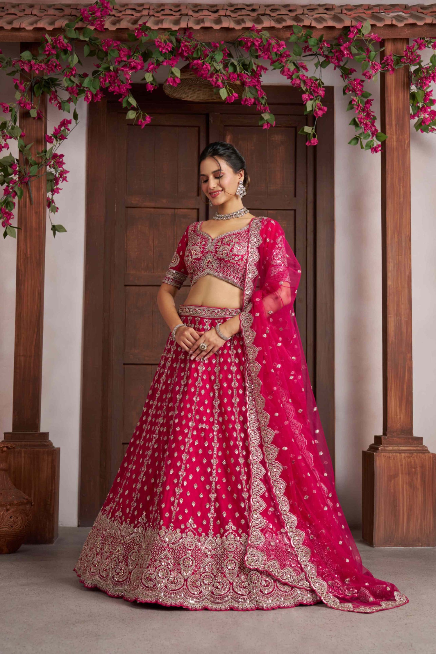Rani Pink Net Lehenga Choli with Heavy Embroidery Work