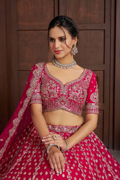 Rani Pink Net Lehenga Choli with Heavy Embroidery Work
