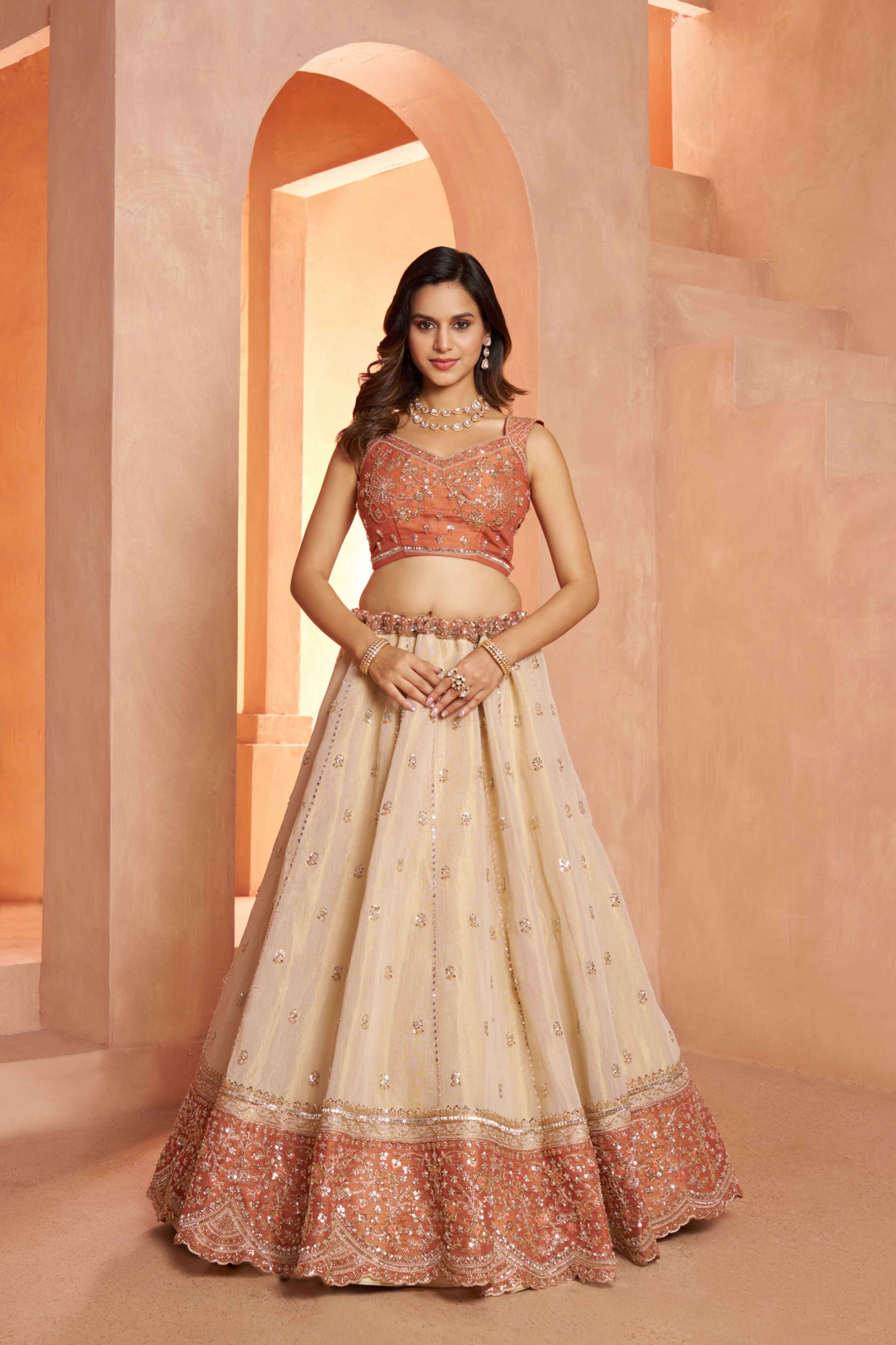 Peach Beige Kanjivaram Tissue Silk Embroidered Lehenga Choli
