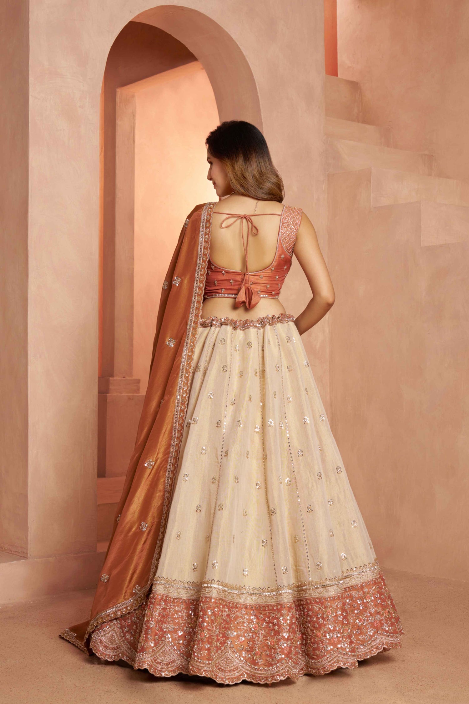 Peach Beige Kanjivaram Tissue Silk Embroidered Lehenga Choli