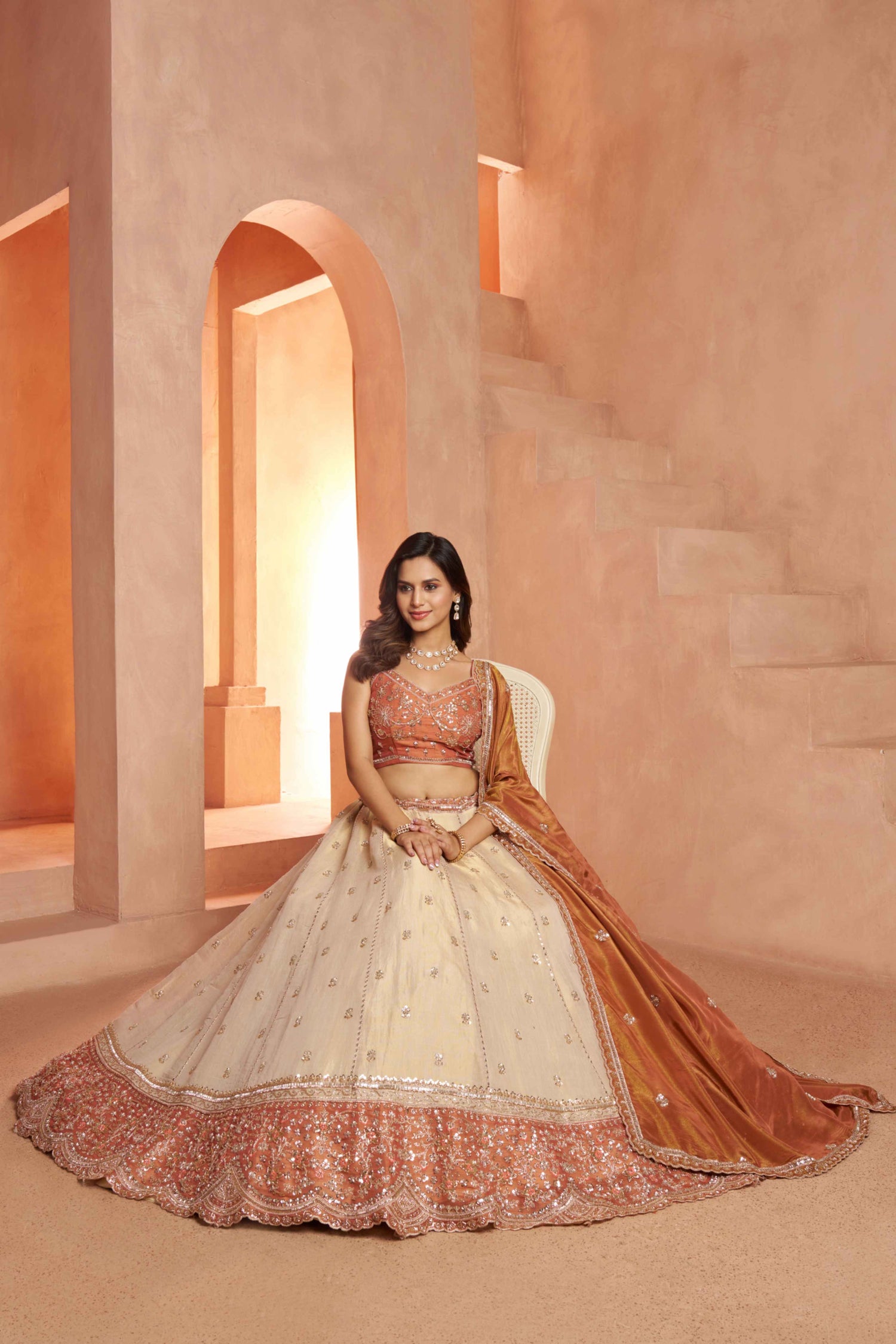 Peach Beige Kanjivaram Tissue Silk Embroidered Lehenga Choli
