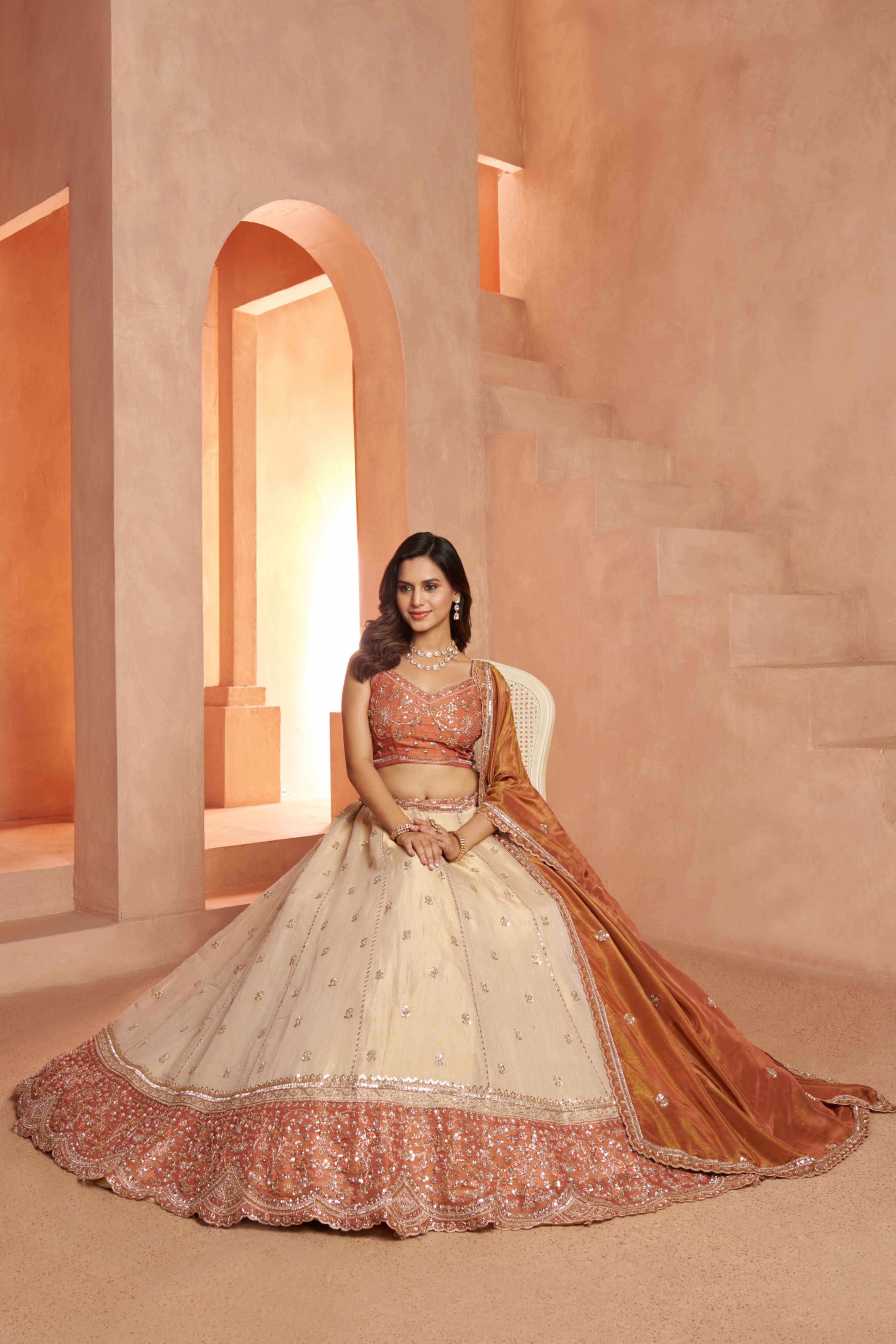 Peach Beige Kanjivaram Tissue Silk Embroidered Lehenga Choli