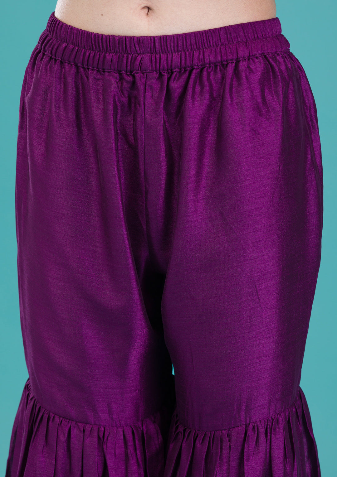 bottom view of purple sharara suit