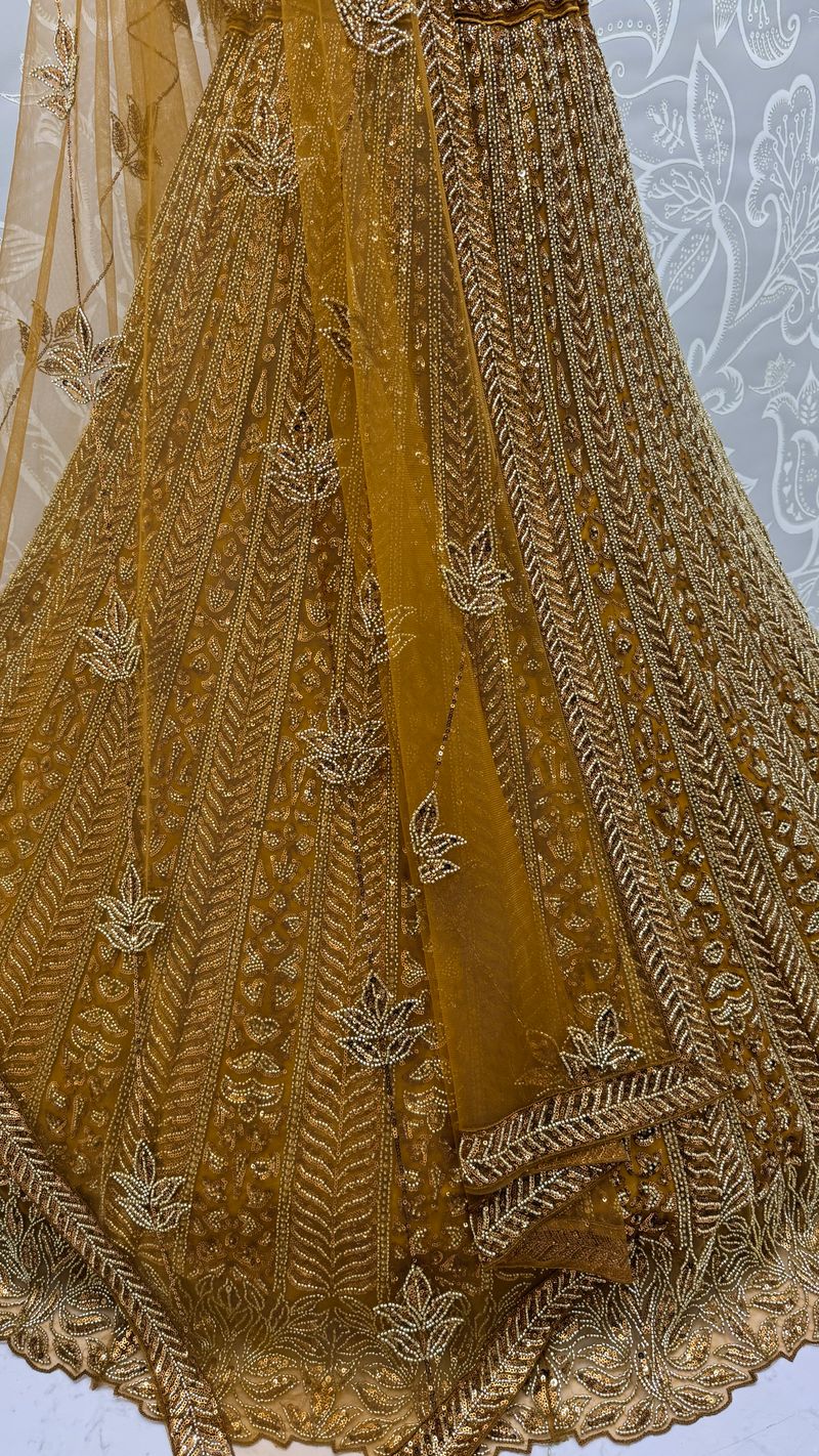 Golden Pure Soft Net Heavy Embroidery Work Bridal Lehenga 