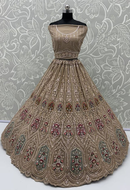 Chiku Pure Heavy Net Motif Handwork Zari Sequins Work Bridal Lehenga Choli