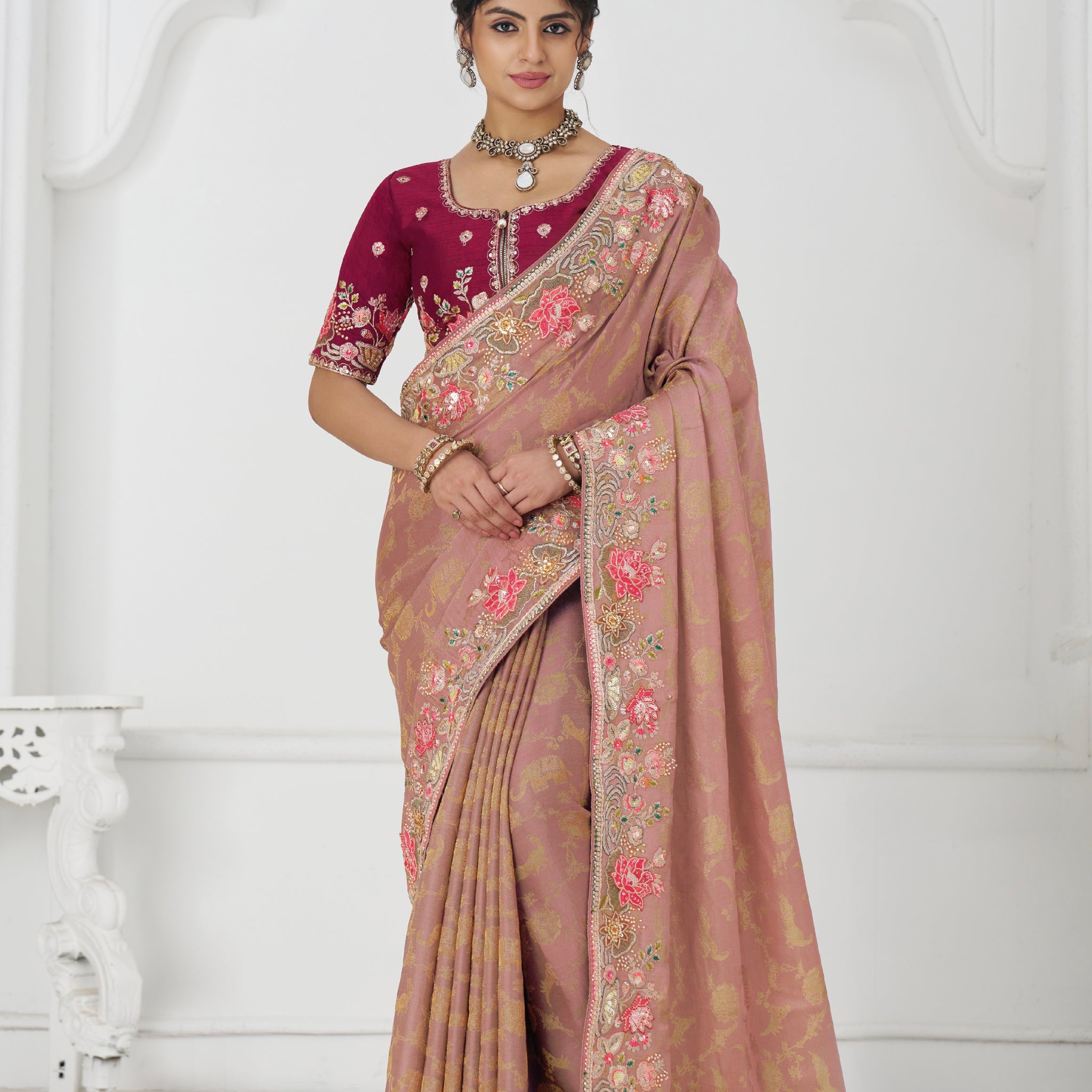 Peach Dola silk saree with floral threadwork