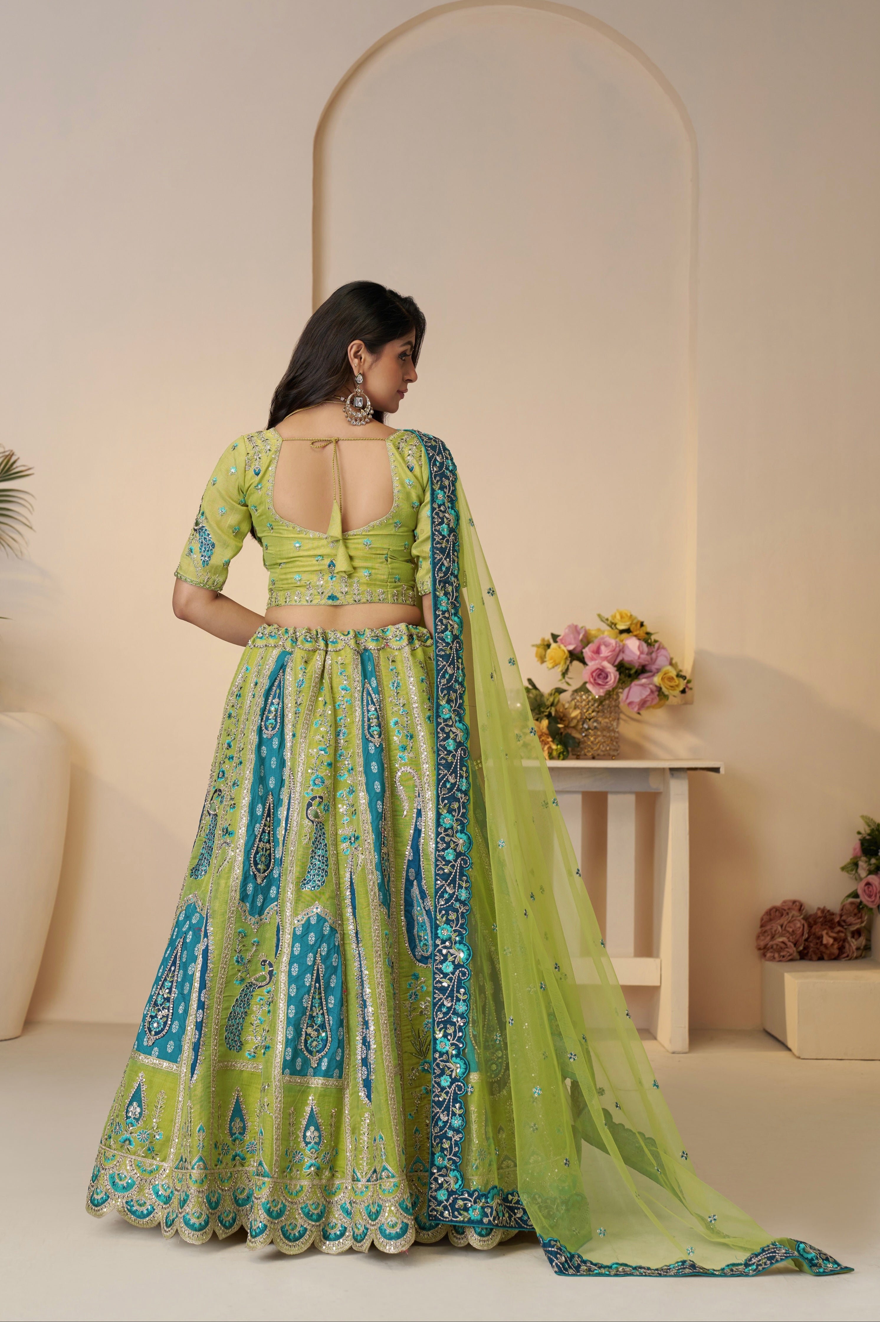 Zari embroidered Banarasi lehenga in green

