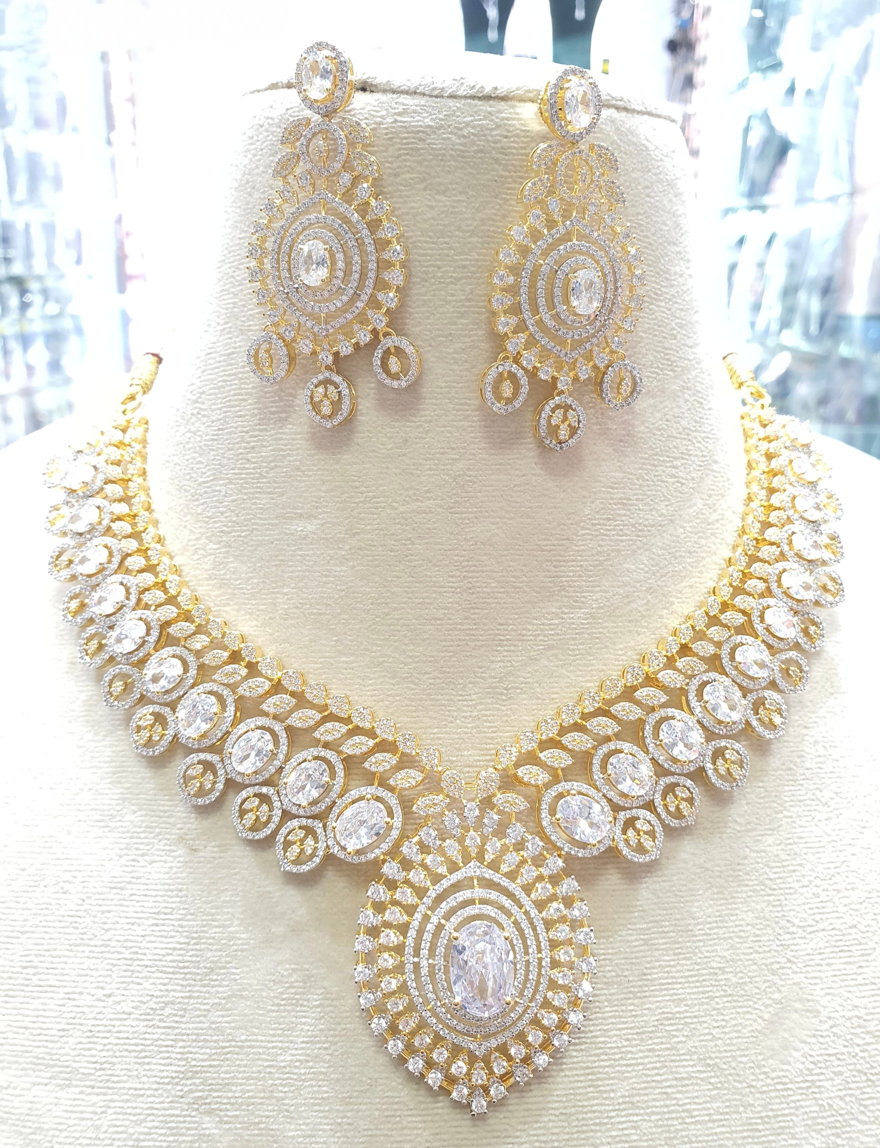 Gold toned white bridal necklace