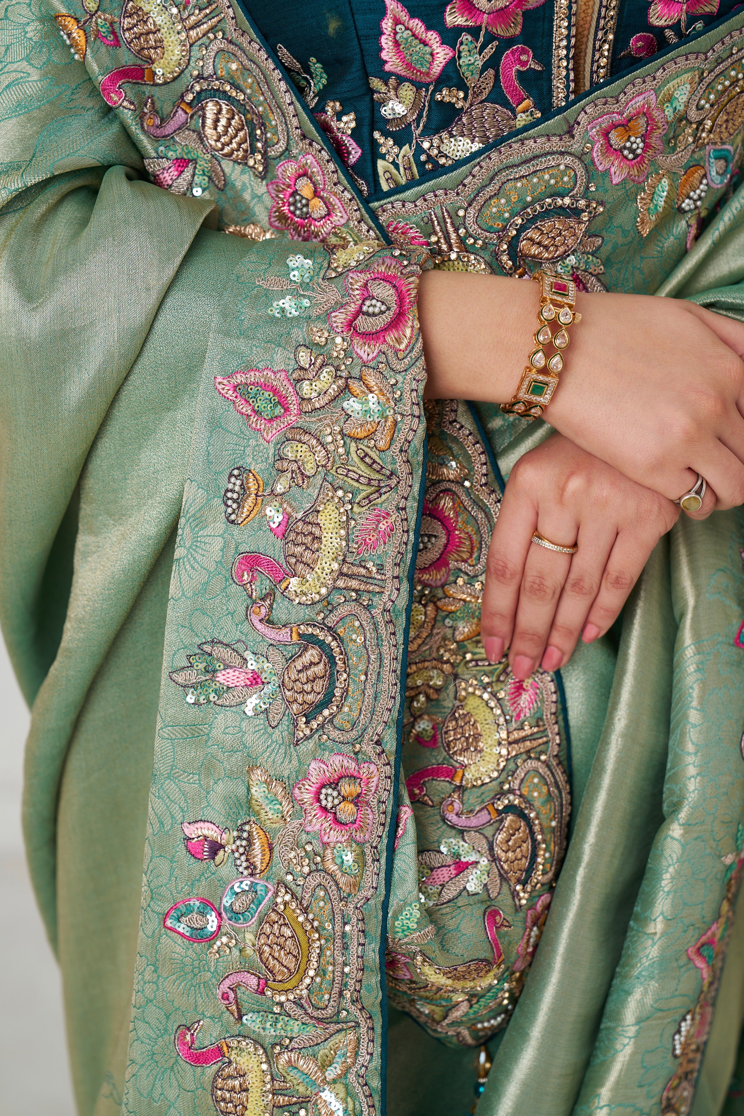 Designer emerald green silk saree with blouse