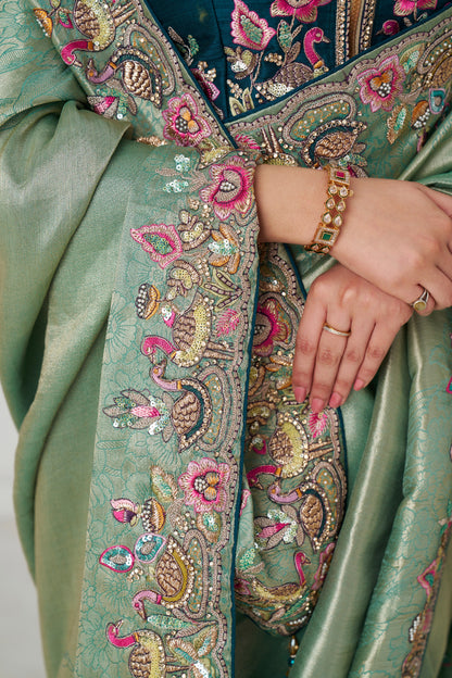 Designer emerald green silk saree with blouse