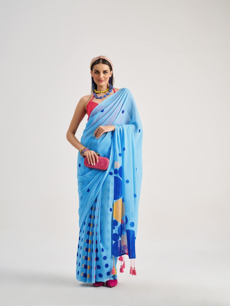 Light blue georgette saree with bold polka dots

