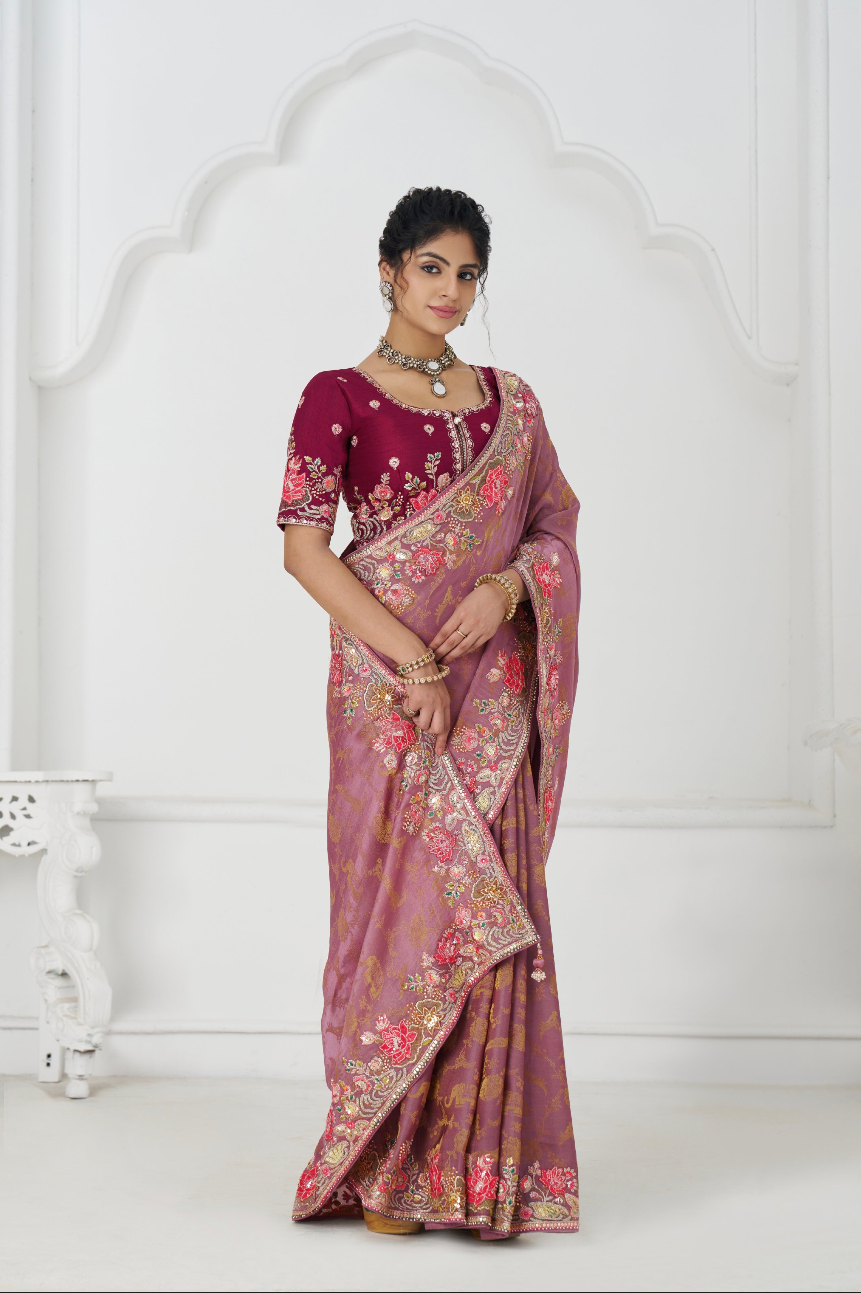 Pink saree with unstitched blouse and embroidery