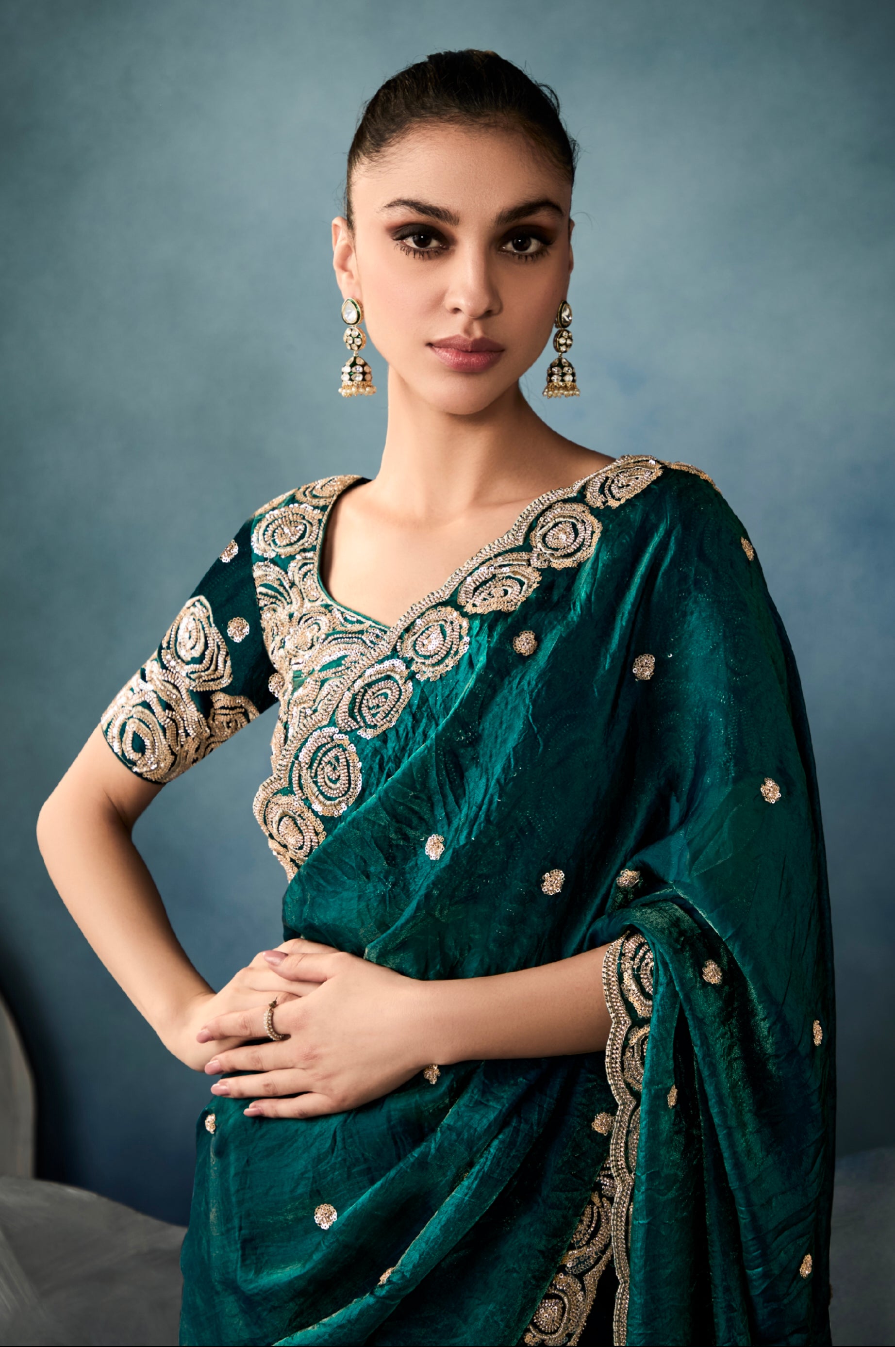 Elegant bottle green designer tissue saree with satin blouse

