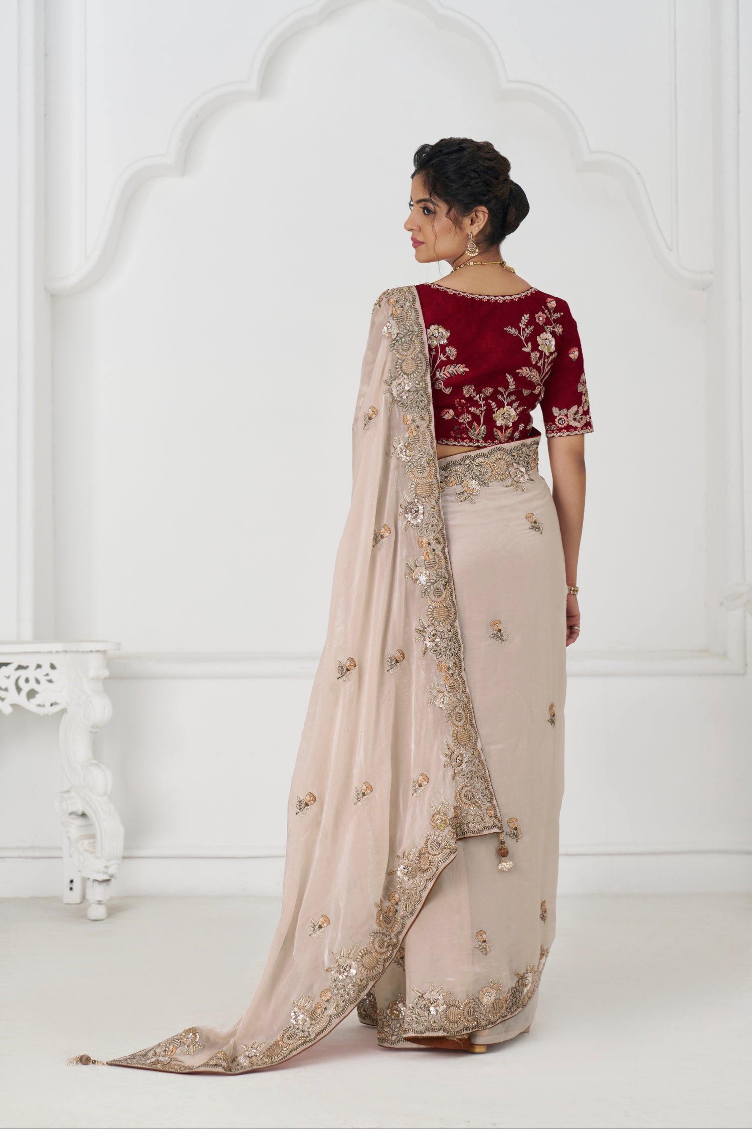 Chiku ethnic saree with sequin and zari detailing