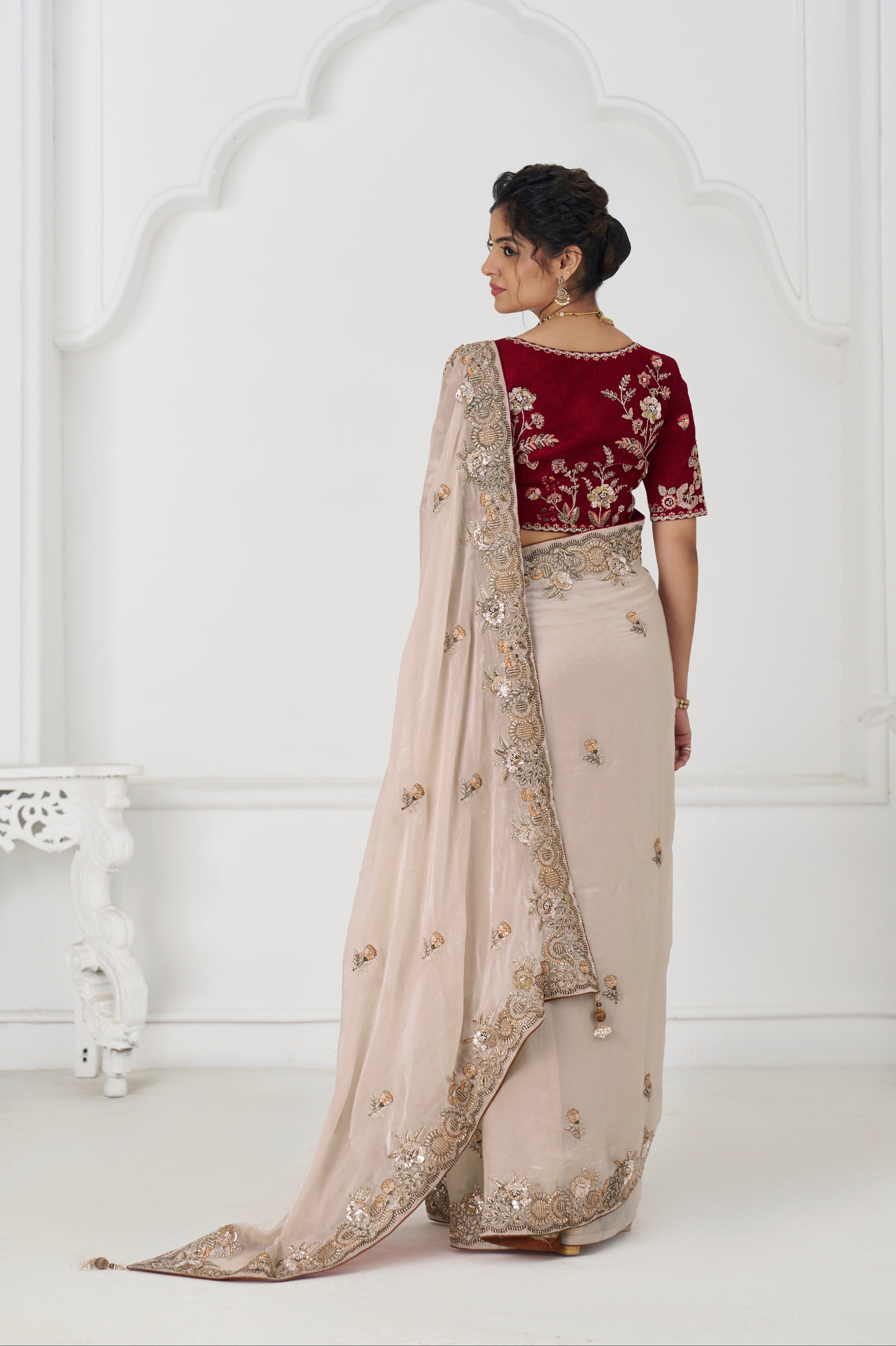 Chiku ethnic saree with sequin and zari detailing