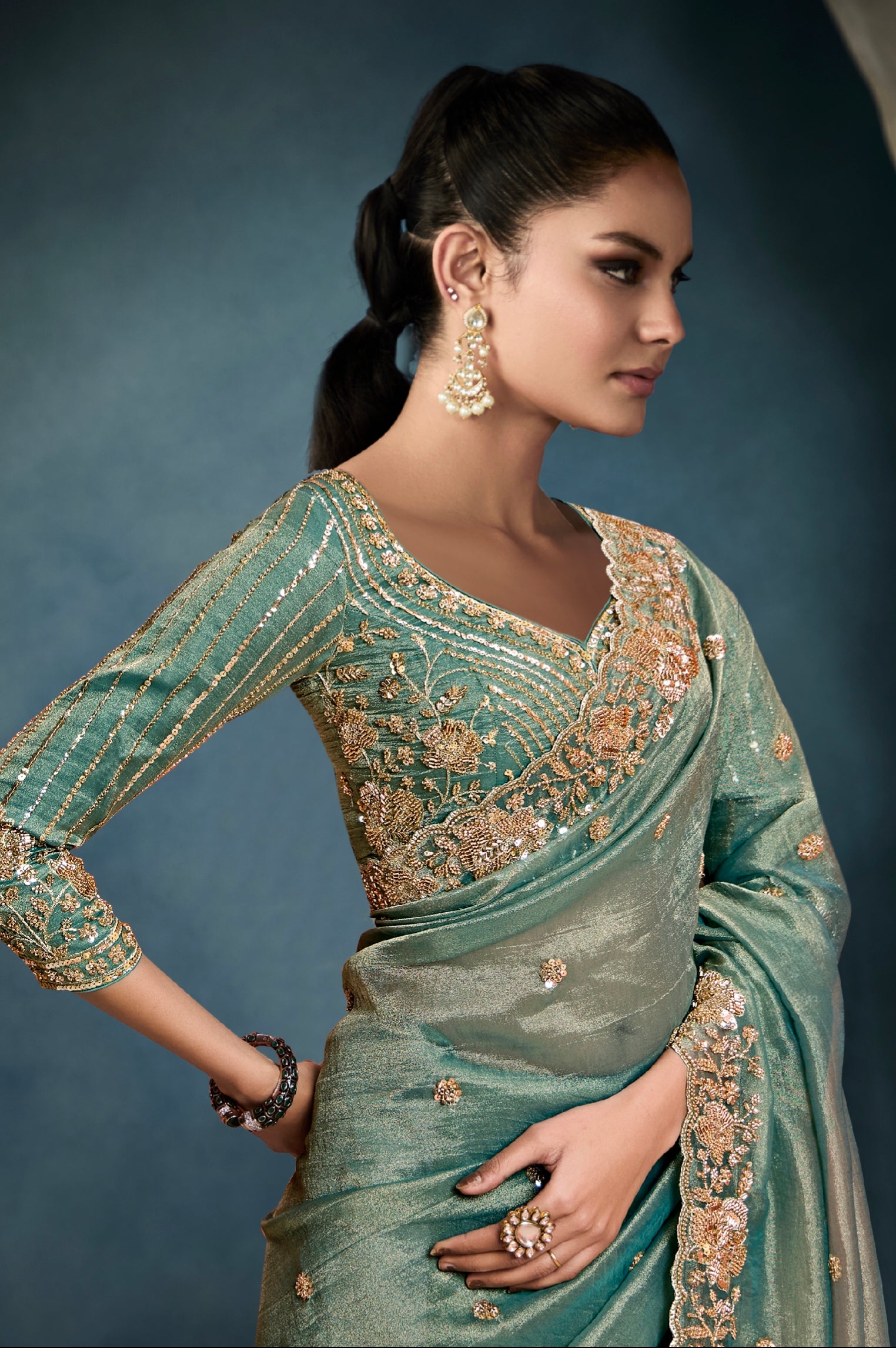 Designer sage green saree with cutwork satin blouse