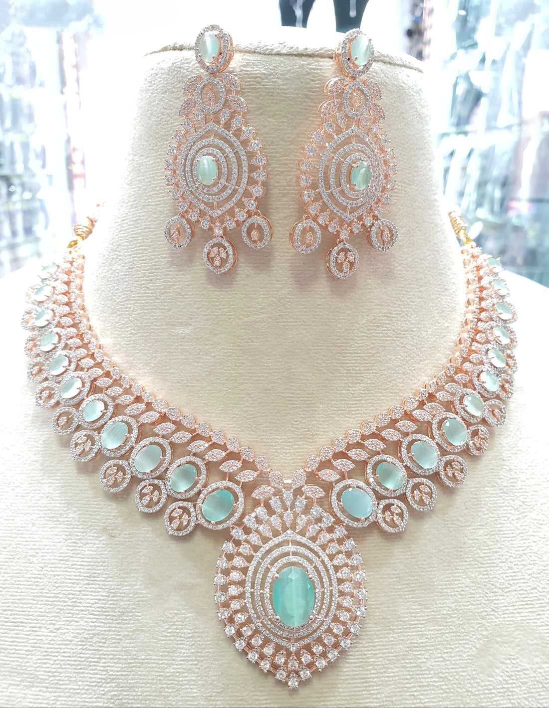 Mint green stone bridal necklace set in rose gold

