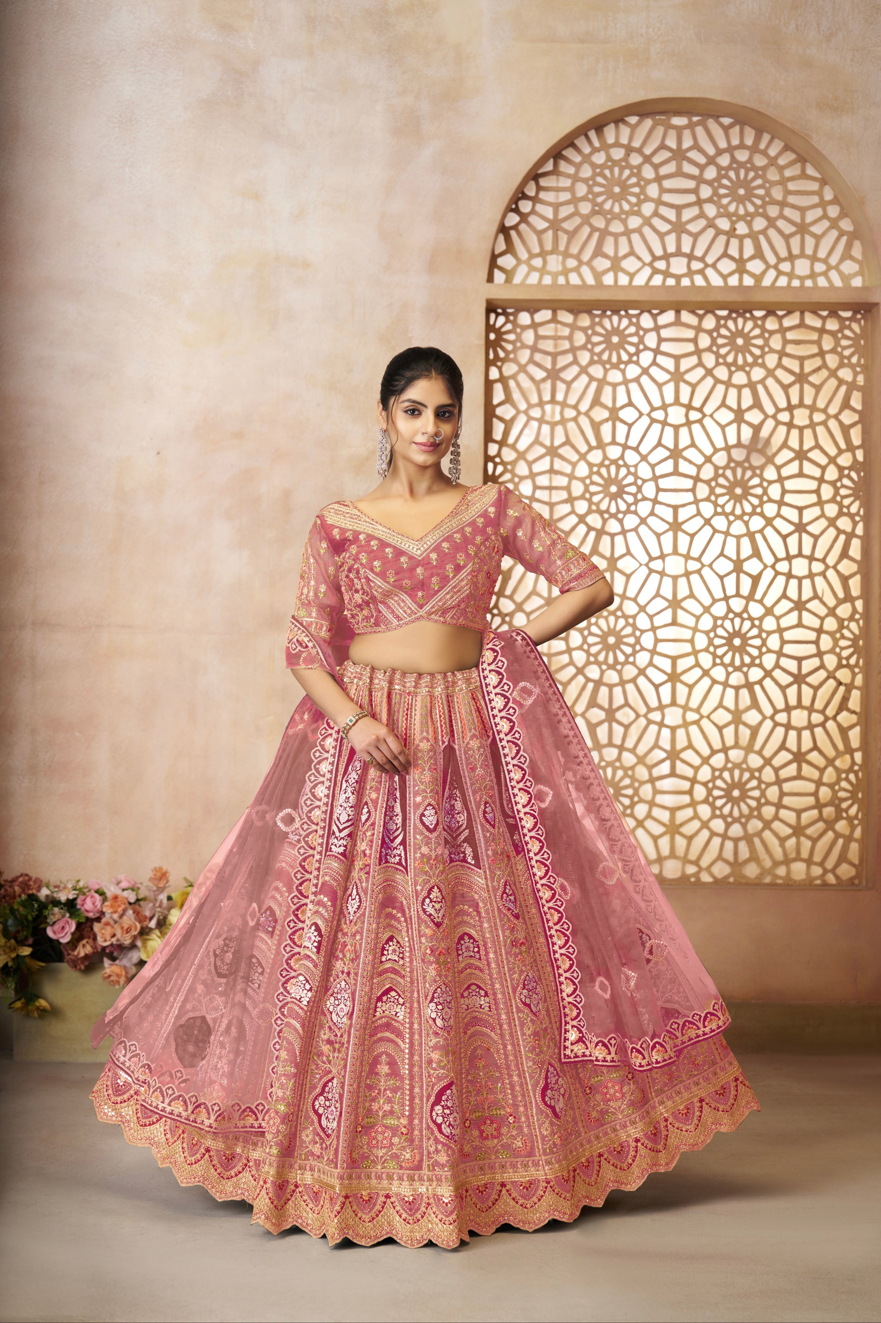 Semi-stitched pink lehenga set with blouse and dupatta