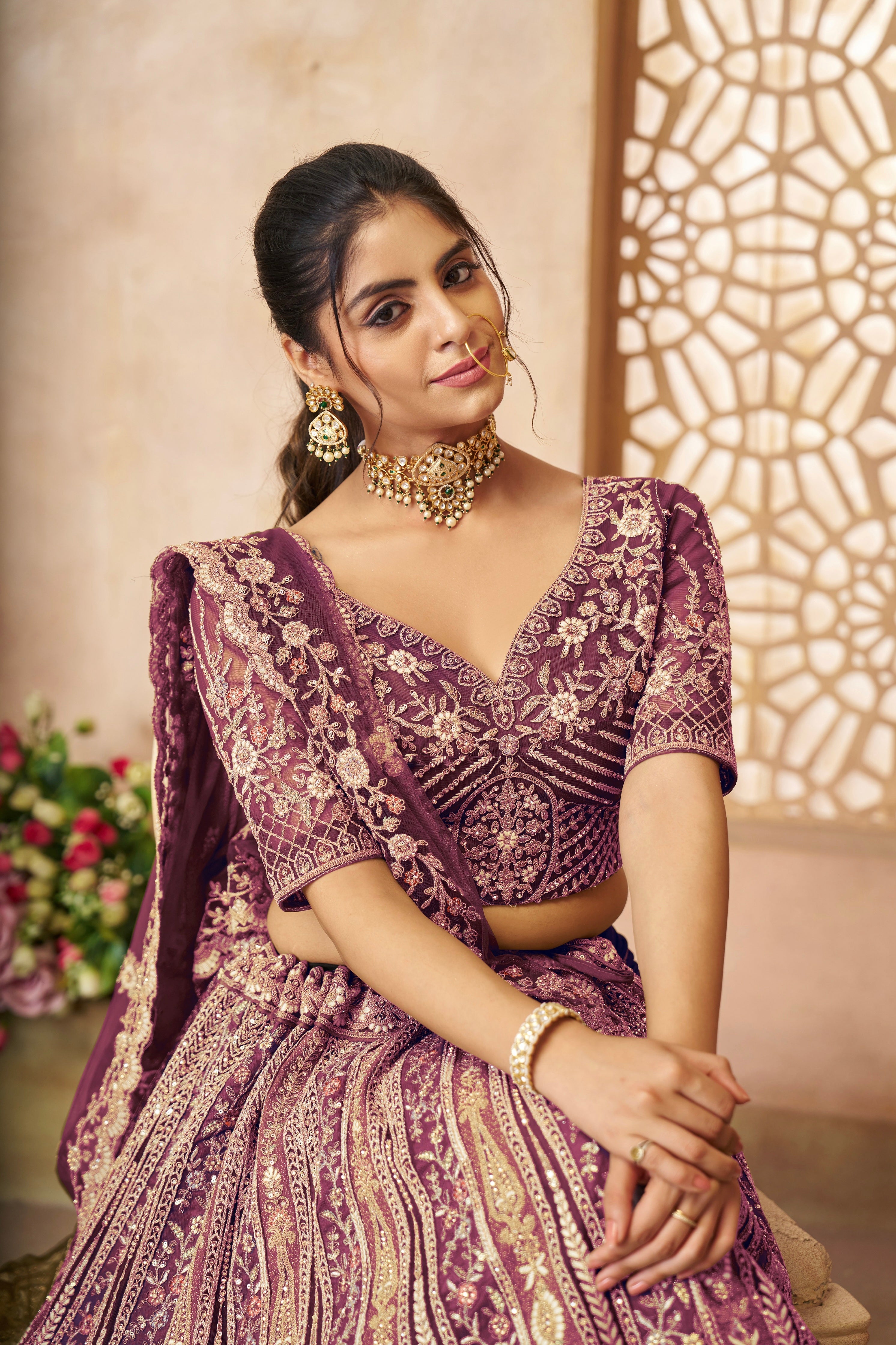 Royal purple bridal lehenga choli with intricate zari and sequin work