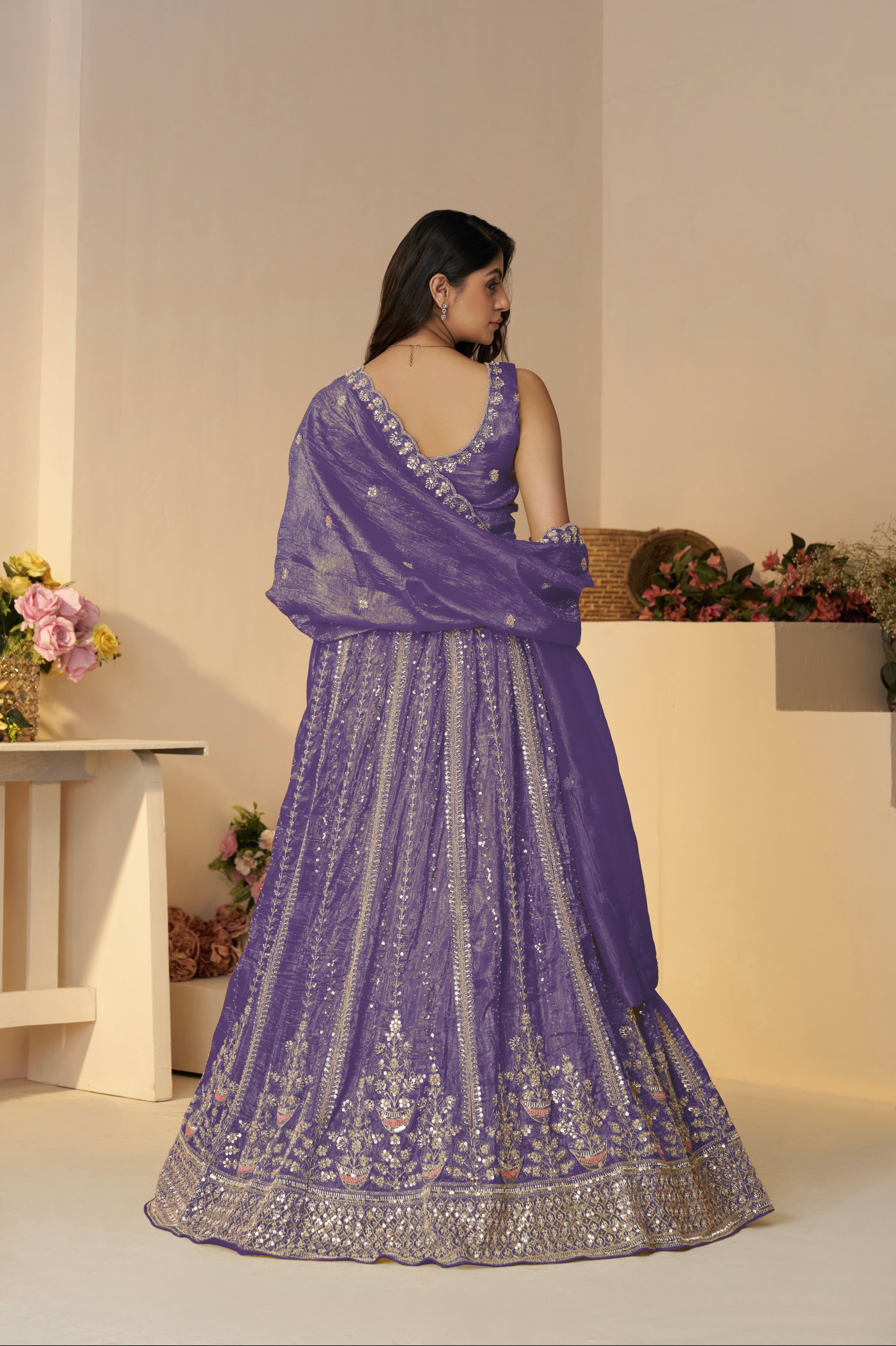 Royal purple lehenga choli set with gold zari work