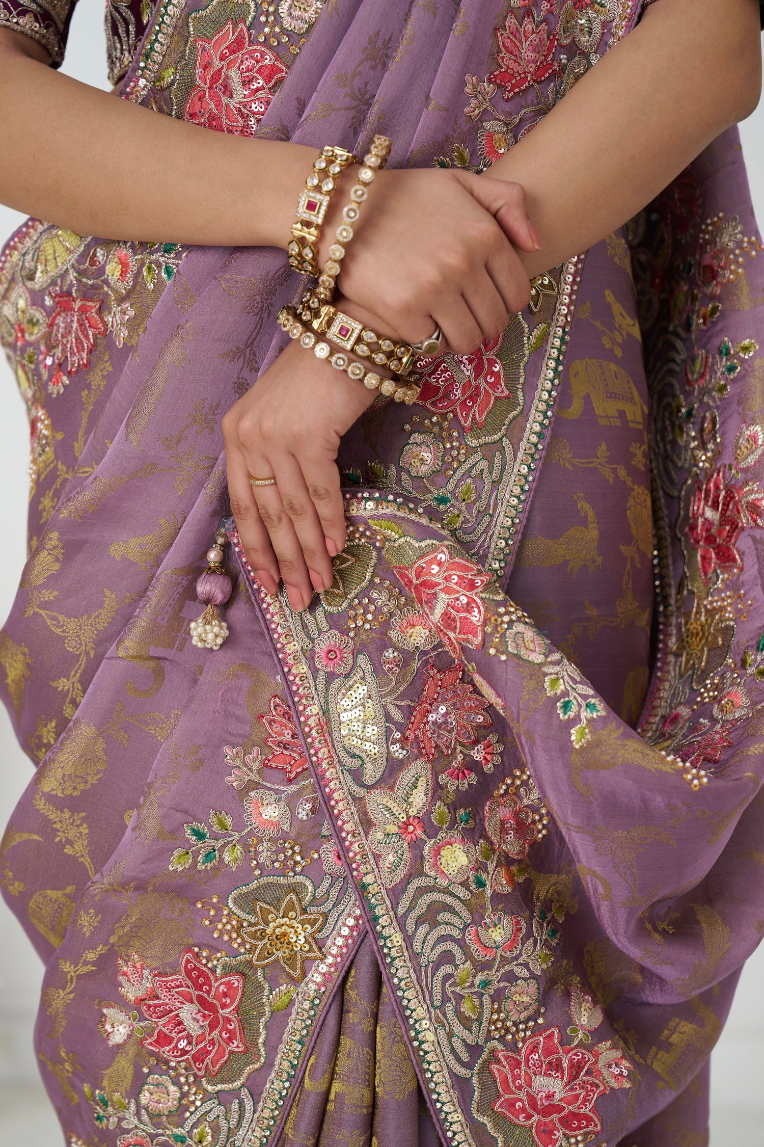 Wedding wear mauve silk saree with paisley motifs