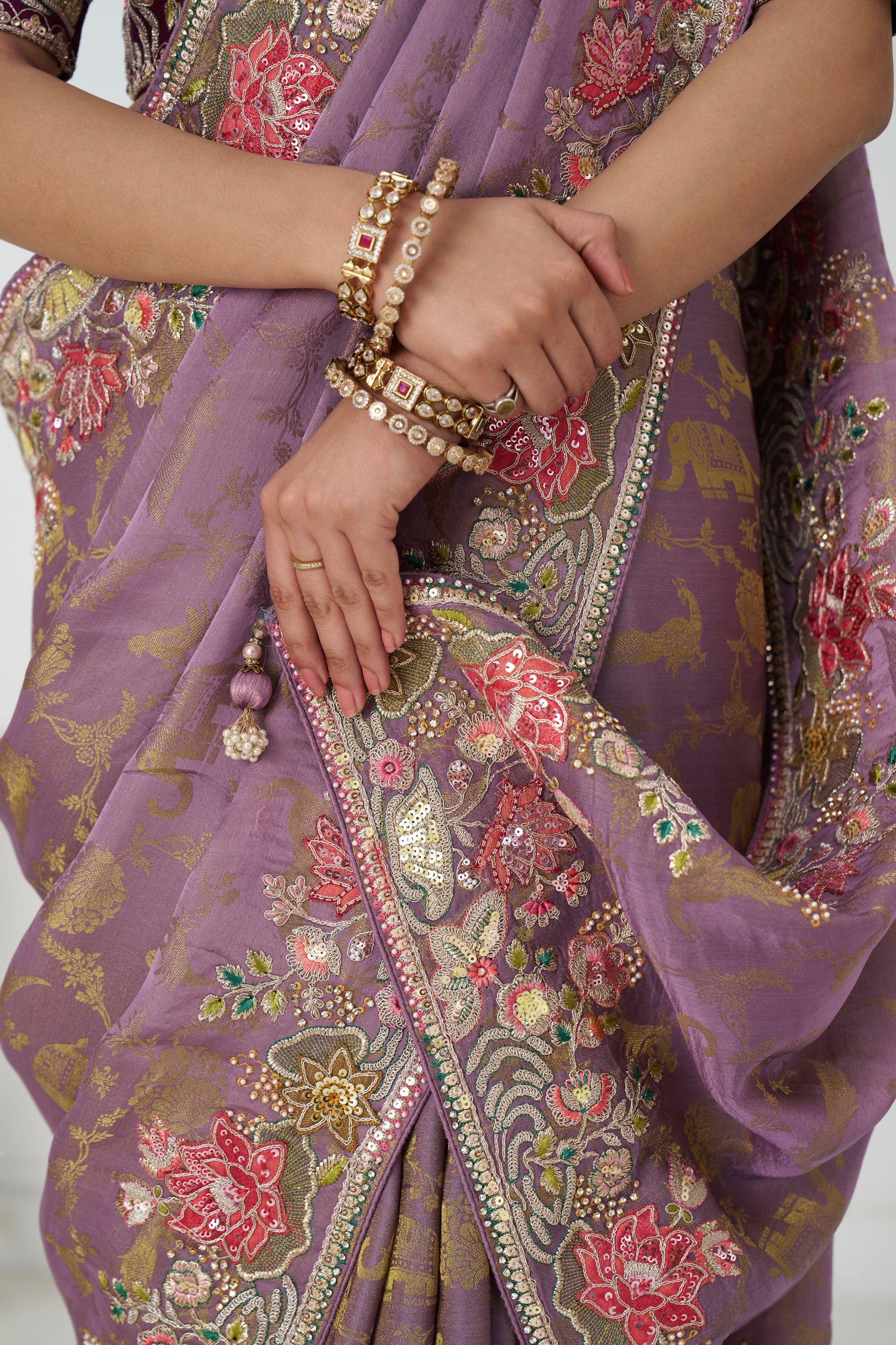 Wedding wear mauve silk saree with paisley motifs