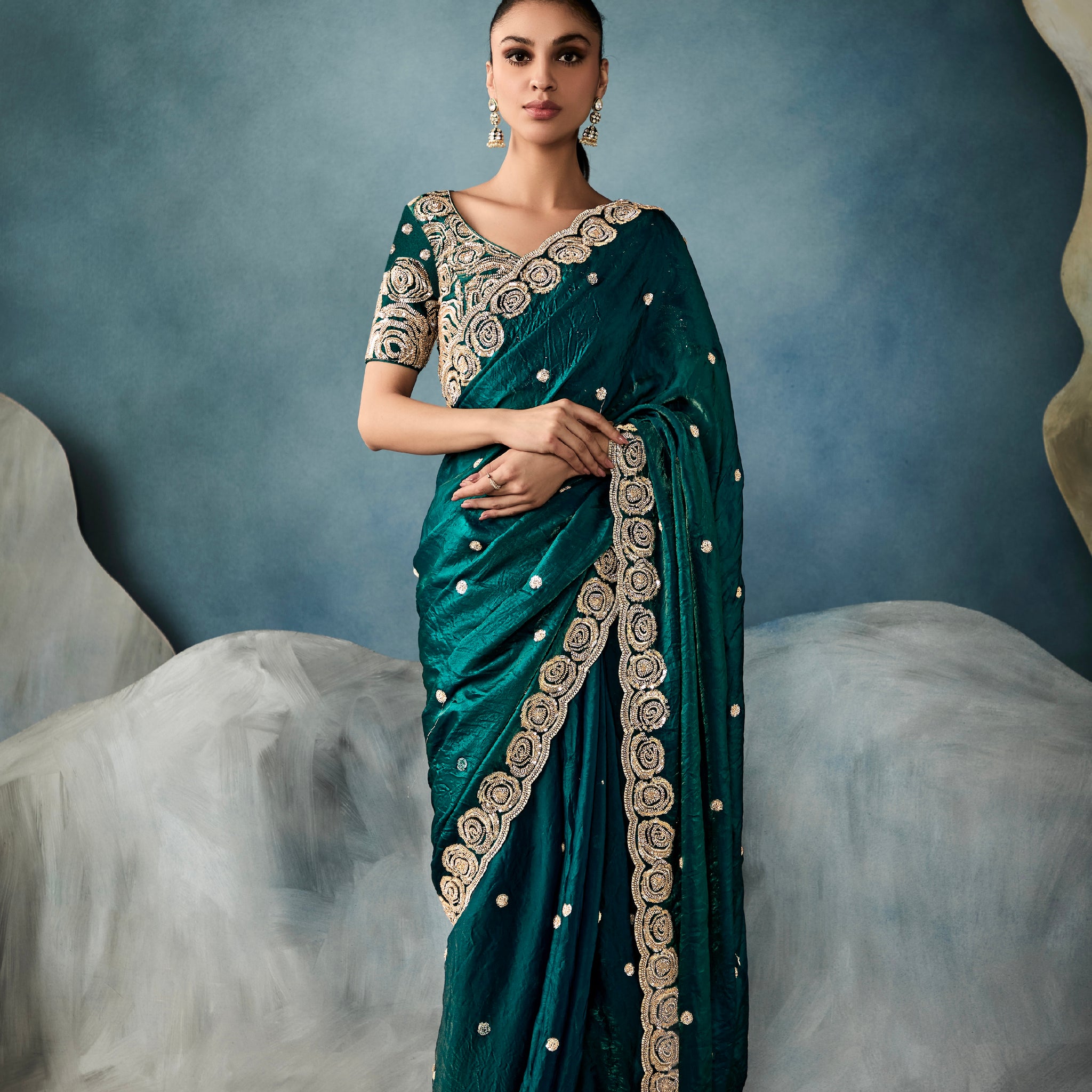 Bottle green tissue saree with hand embroidery


