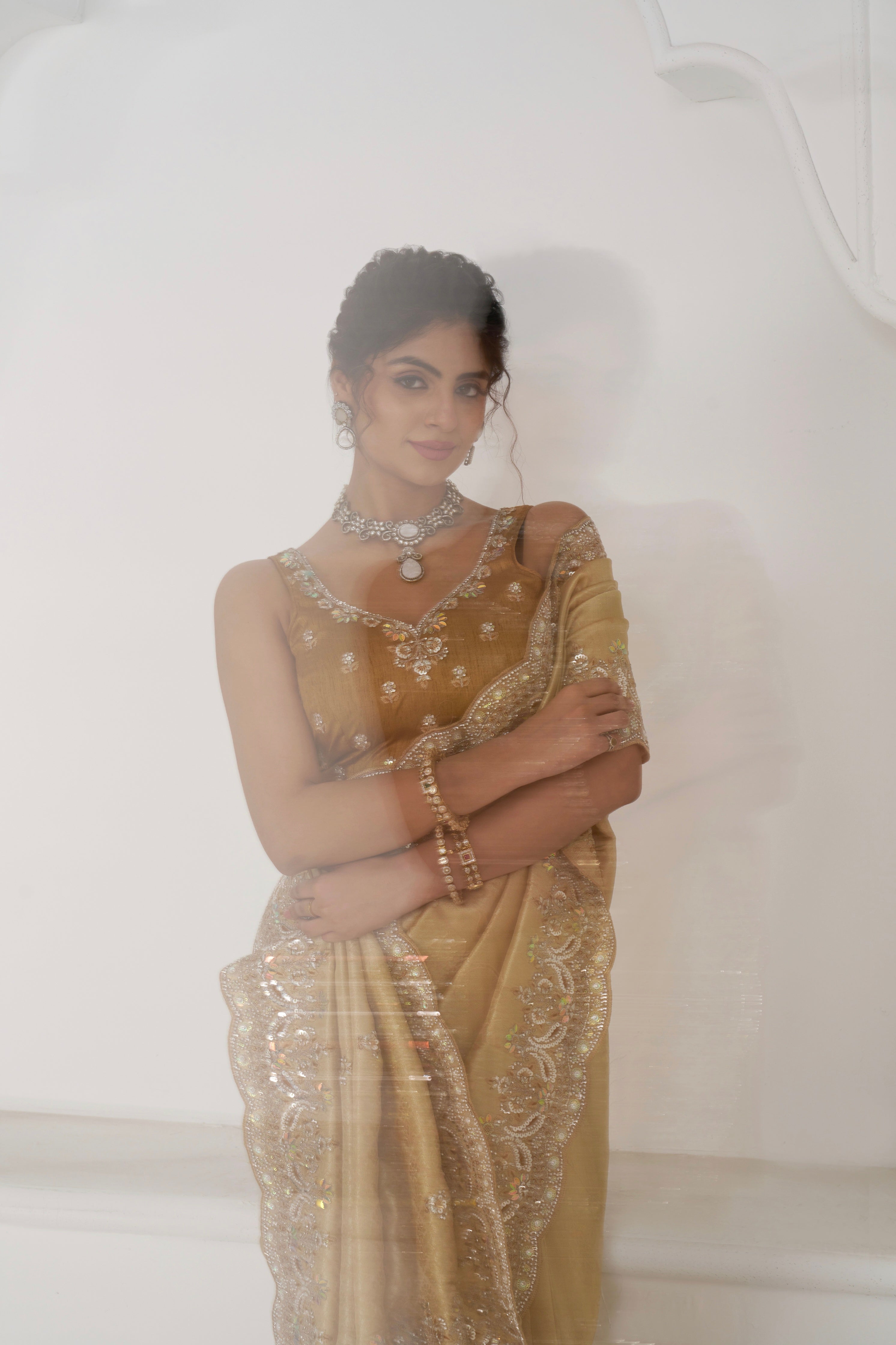 Designer golden saree with matching unstitched blouse