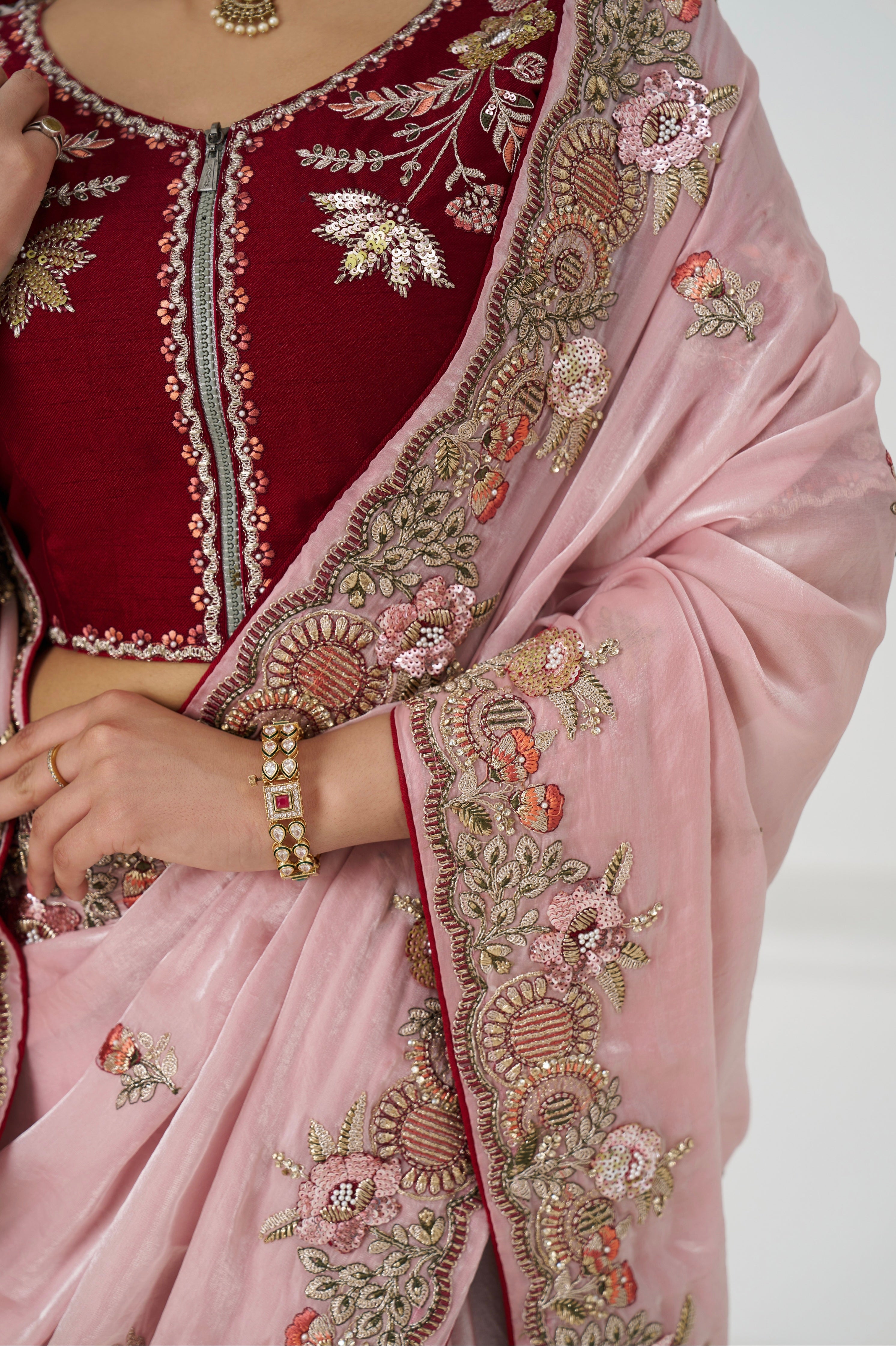 Traditional pink saree with hand embroidery