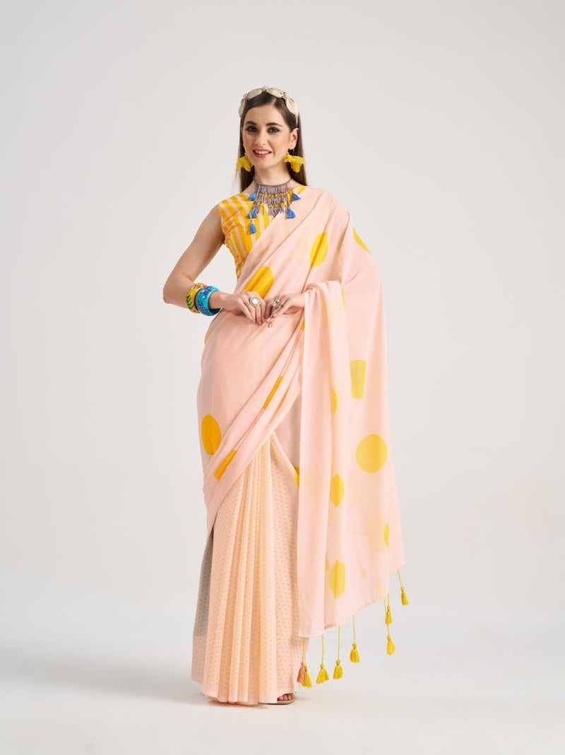Peach georgette saree with yellow polka dots

