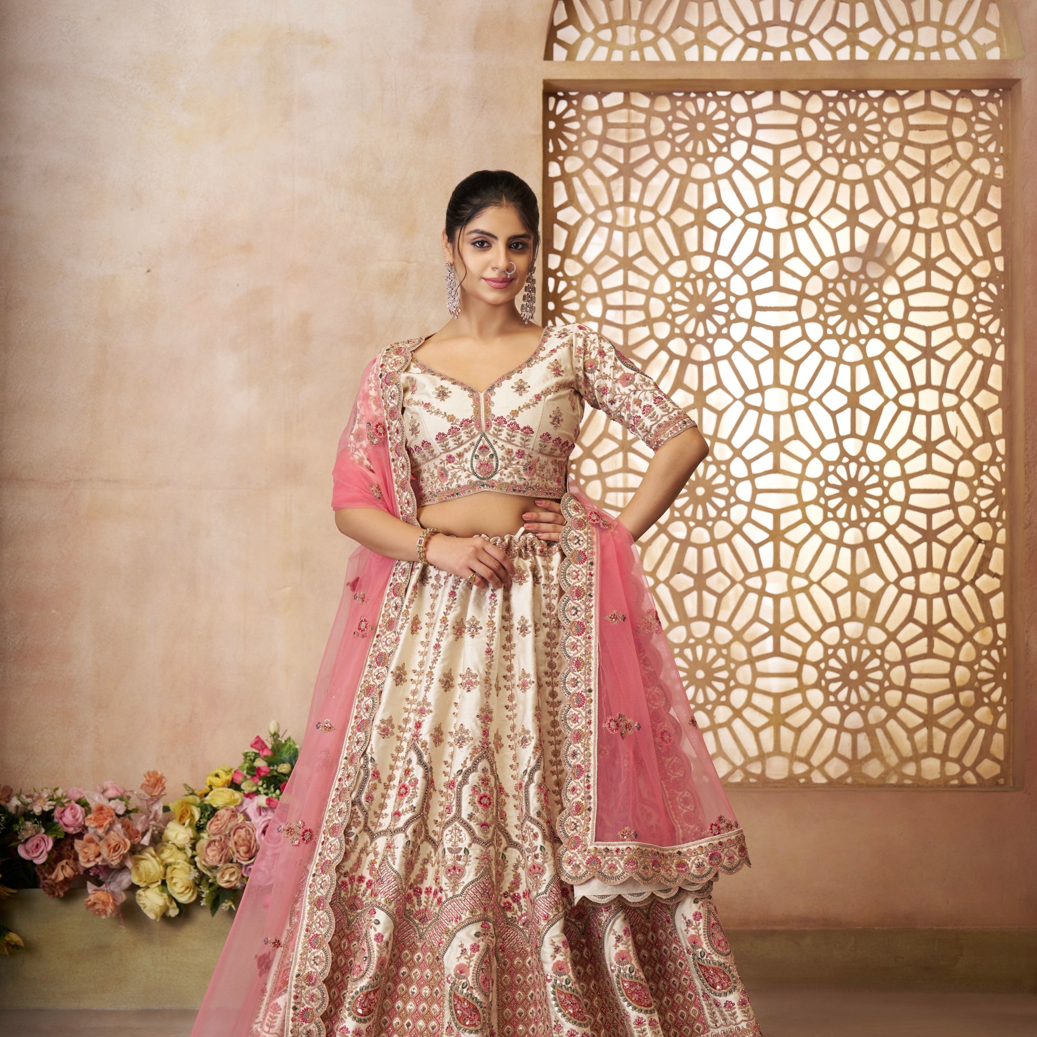 White silk bridal lehenga with pink embroidered dupatta for Indian wedding