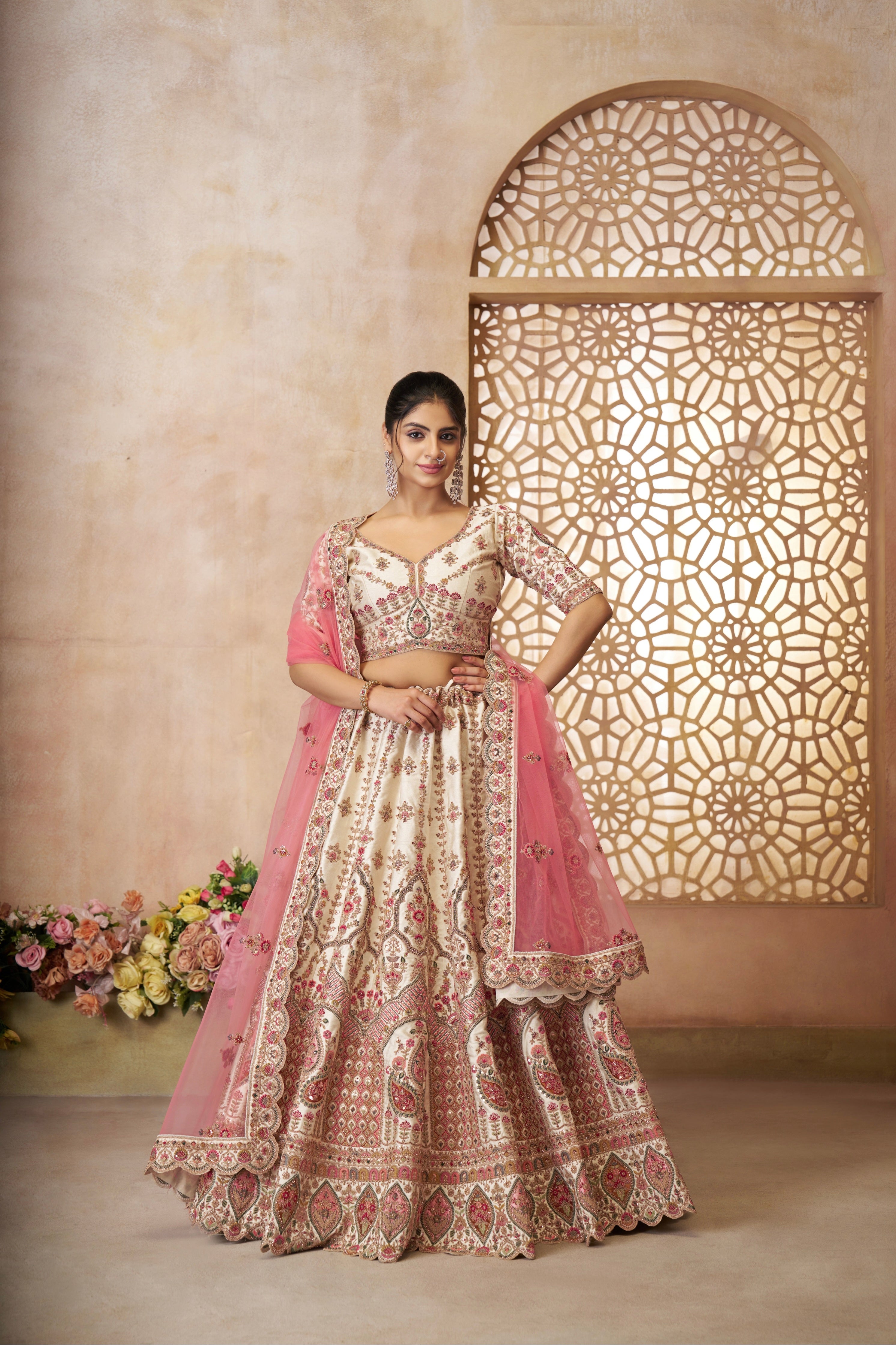 White silk bridal lehenga with pink embroidered dupatta for Indian wedding