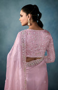 Elegant mauve tissue saree for wedding events

