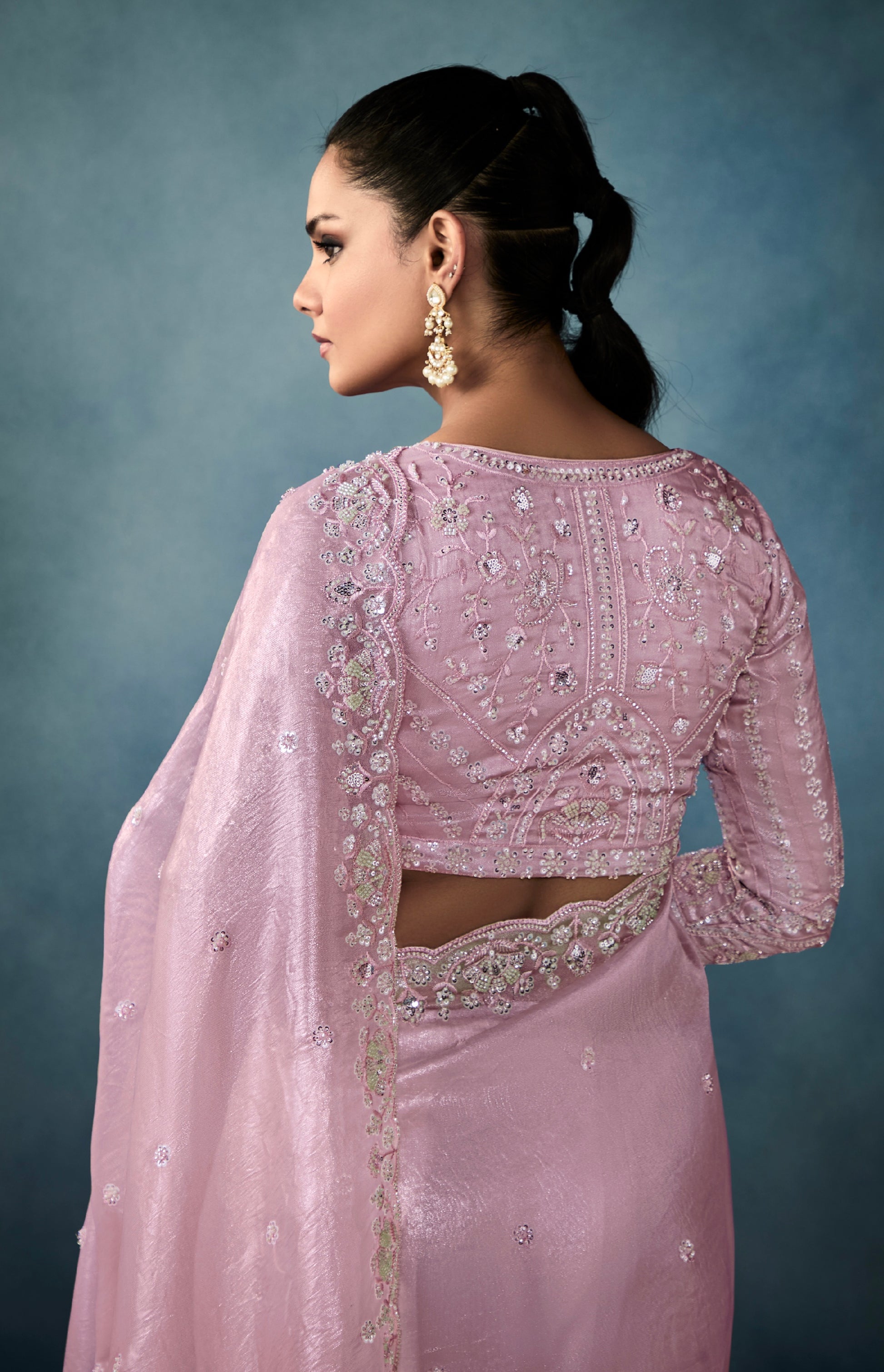 Elegant mauve tissue saree for wedding events


